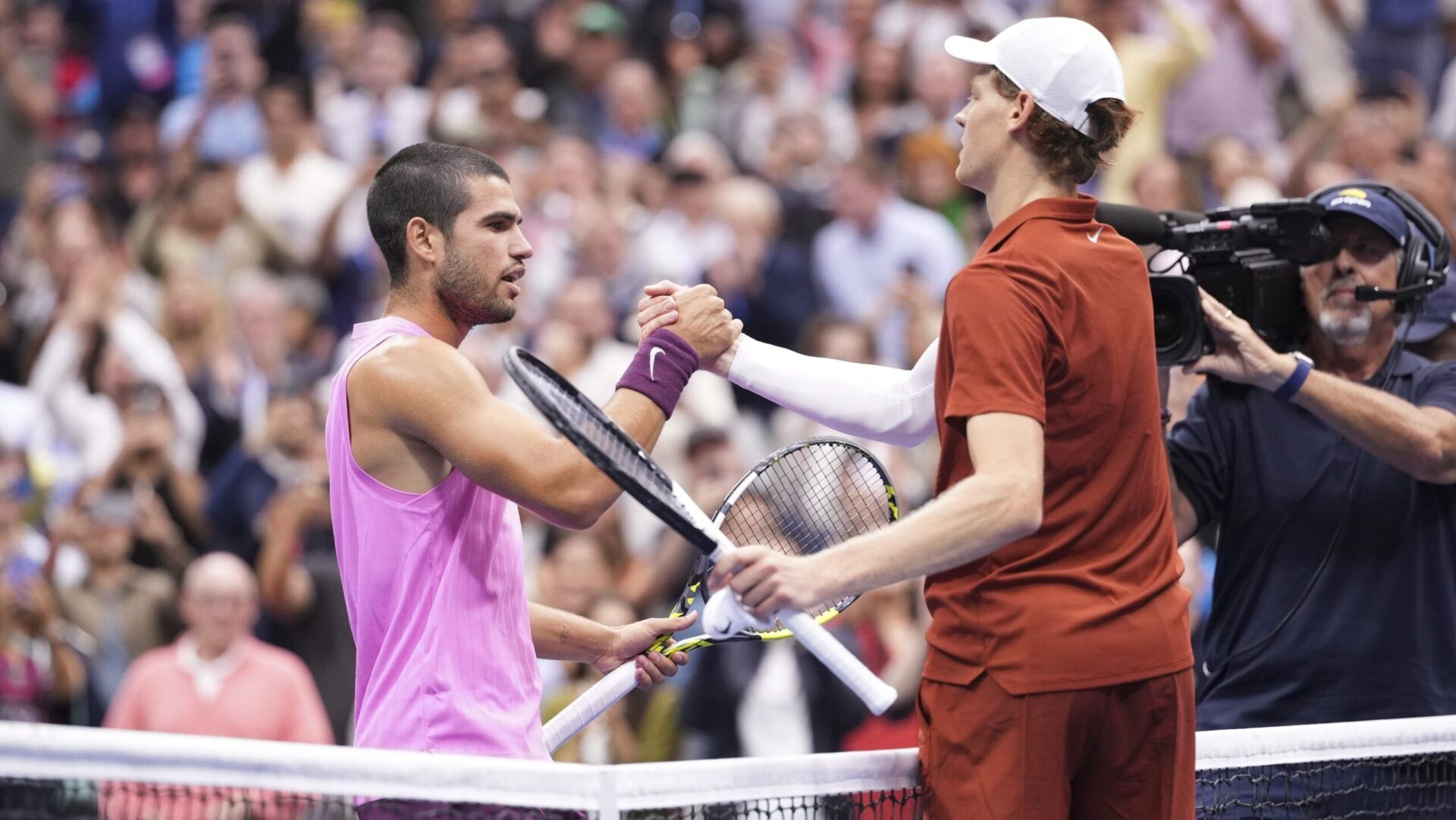 Carlos Alcaraz (ESP) shakes hands with Jannik Sinner (ITA) after the final of mens singles at Billie Jean King National Tennis Center.