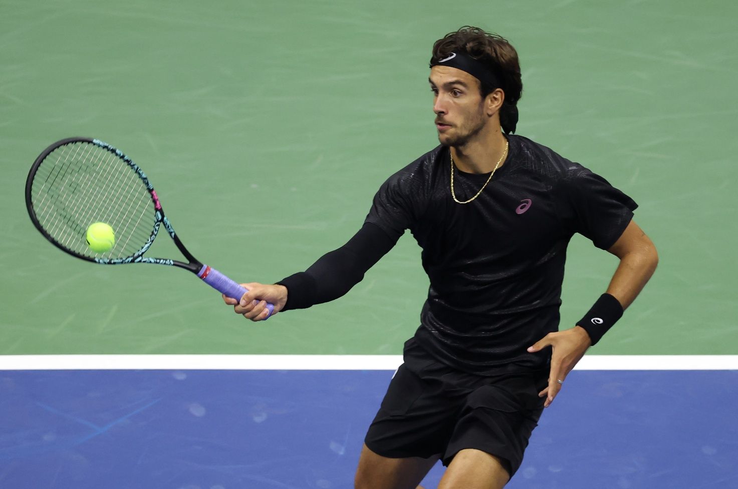 Lorenzo Musetti (ITA) hits a shot against Jannik Sinner (ITA) (not pictured) on day eleven of the 2025 US Open tennis championships at USTA Billie Jean King National Tennis Center.