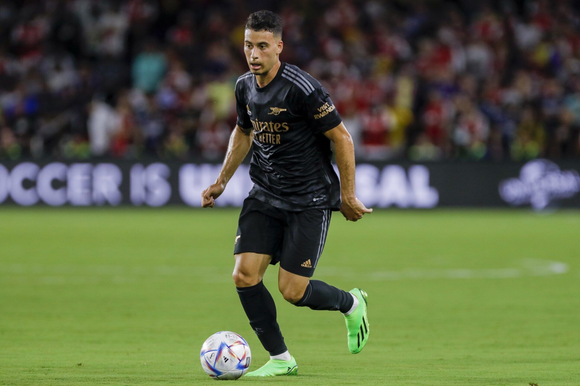 Arsenal forward Gabriel Martinelli (11) runs with the ball during the first half against Orlando City at Exploria Stadium.