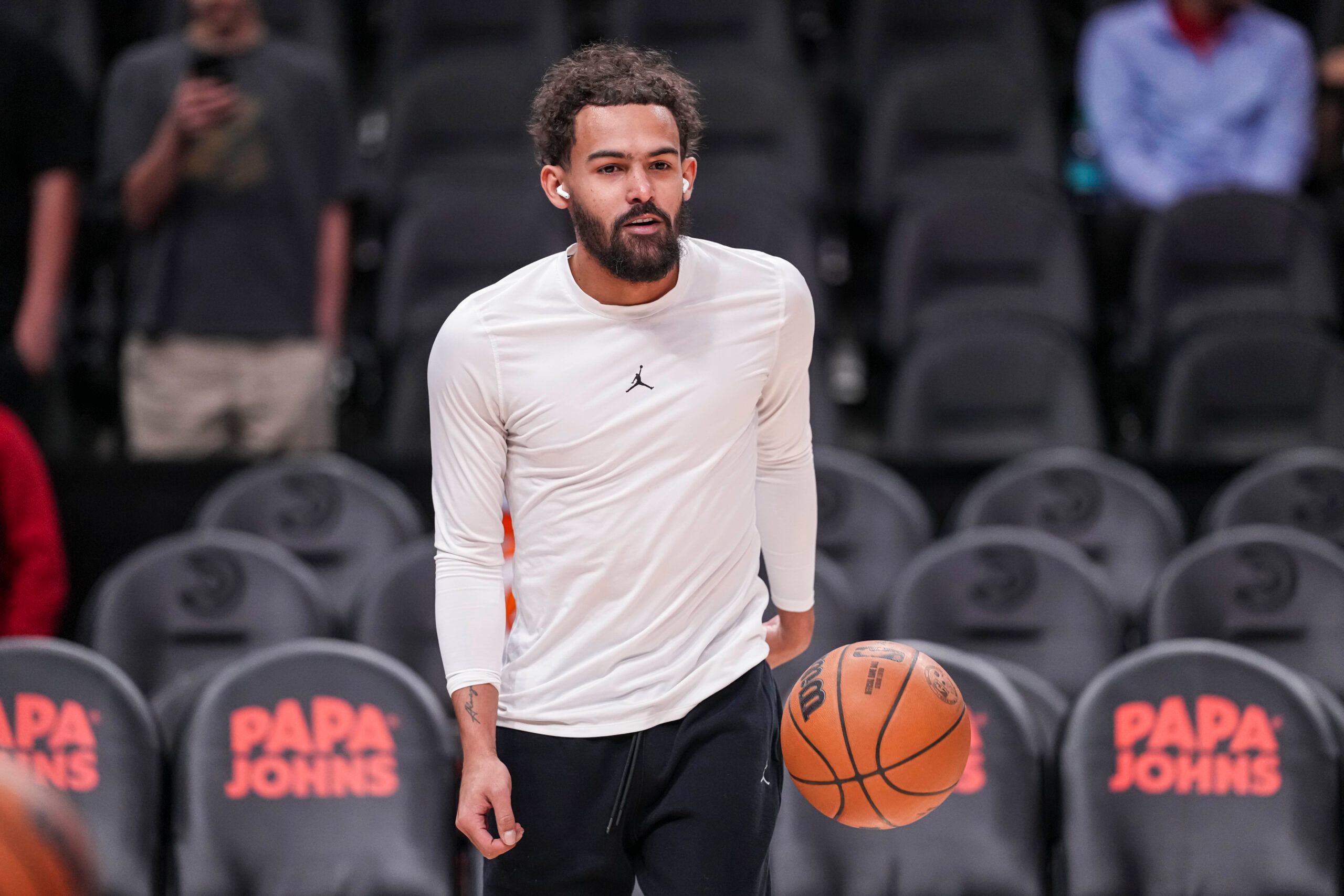 Atlanta Hawks guard Trae Young (11) shown on the court before the game against the New Orleans Pelicans at State Farm Arena.