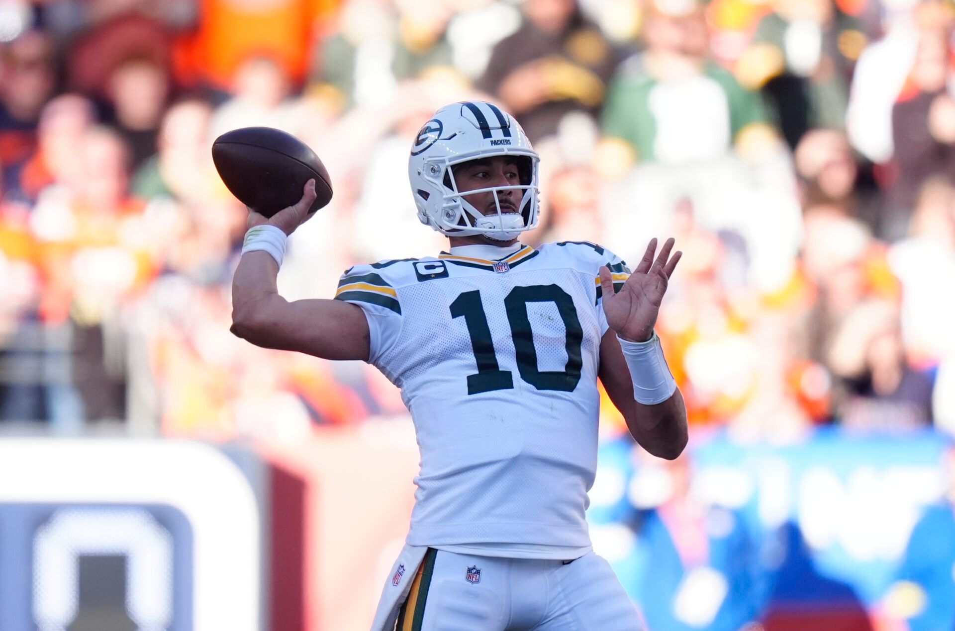 Green Bay Packers quarterback Jordan Love (10) throws downfield during the first quarter against the Denver Broncos at Empower Field at Mile High.