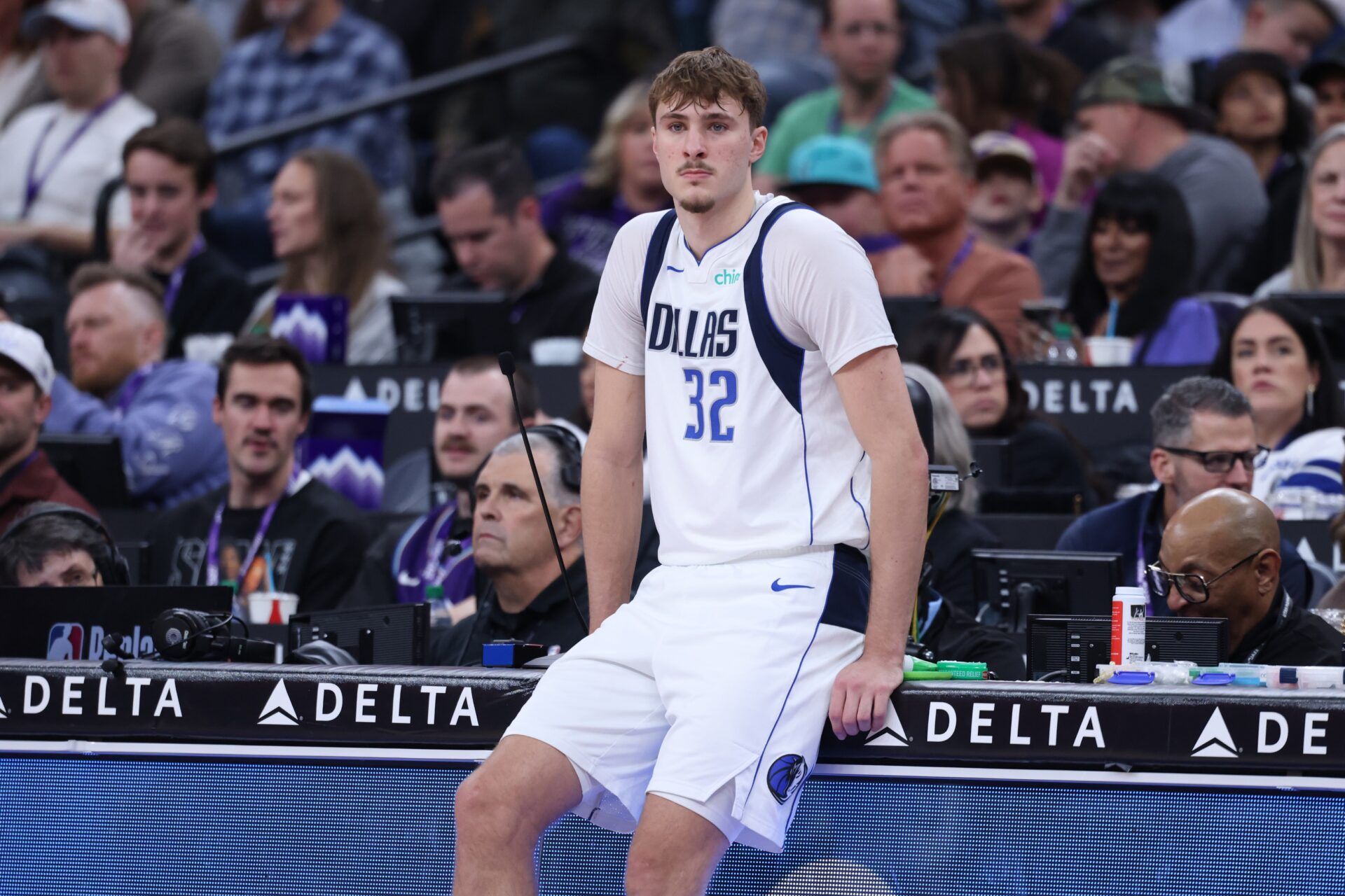 Dallas Mavericks forward Cooper Flagg (32) waits to enter the game against the Utah Jazz during the first half at Delta Center.
