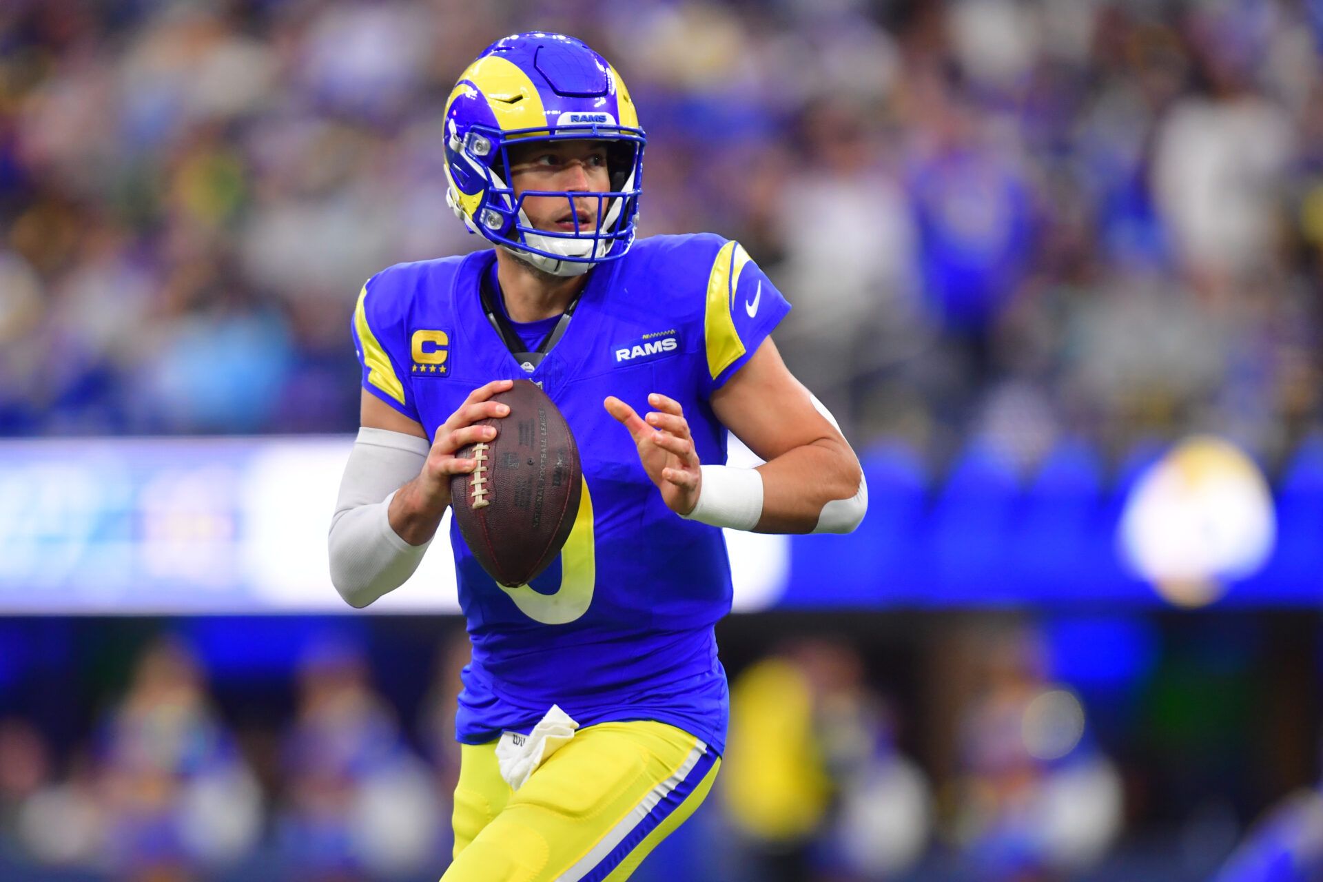 Los Angeles Rams quarterback Matthew Stafford (9) looks downfield against the Arizona Cardinals during the second half at SoFi Stadium.