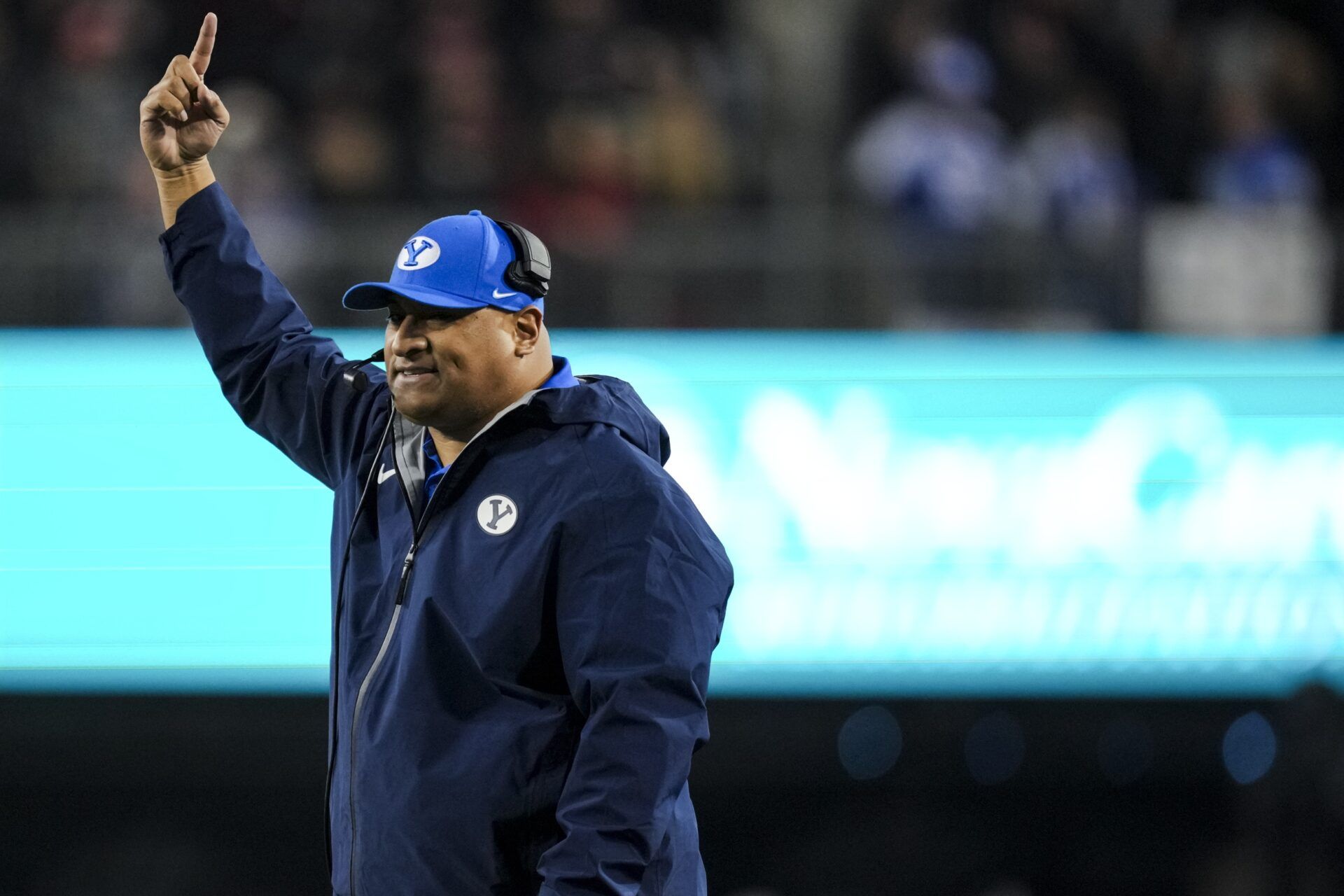 BYU Cougars head coach Kalani Sitake works the sideline against the Cincinnati Bearcats in the second half at Nippert Stadium.