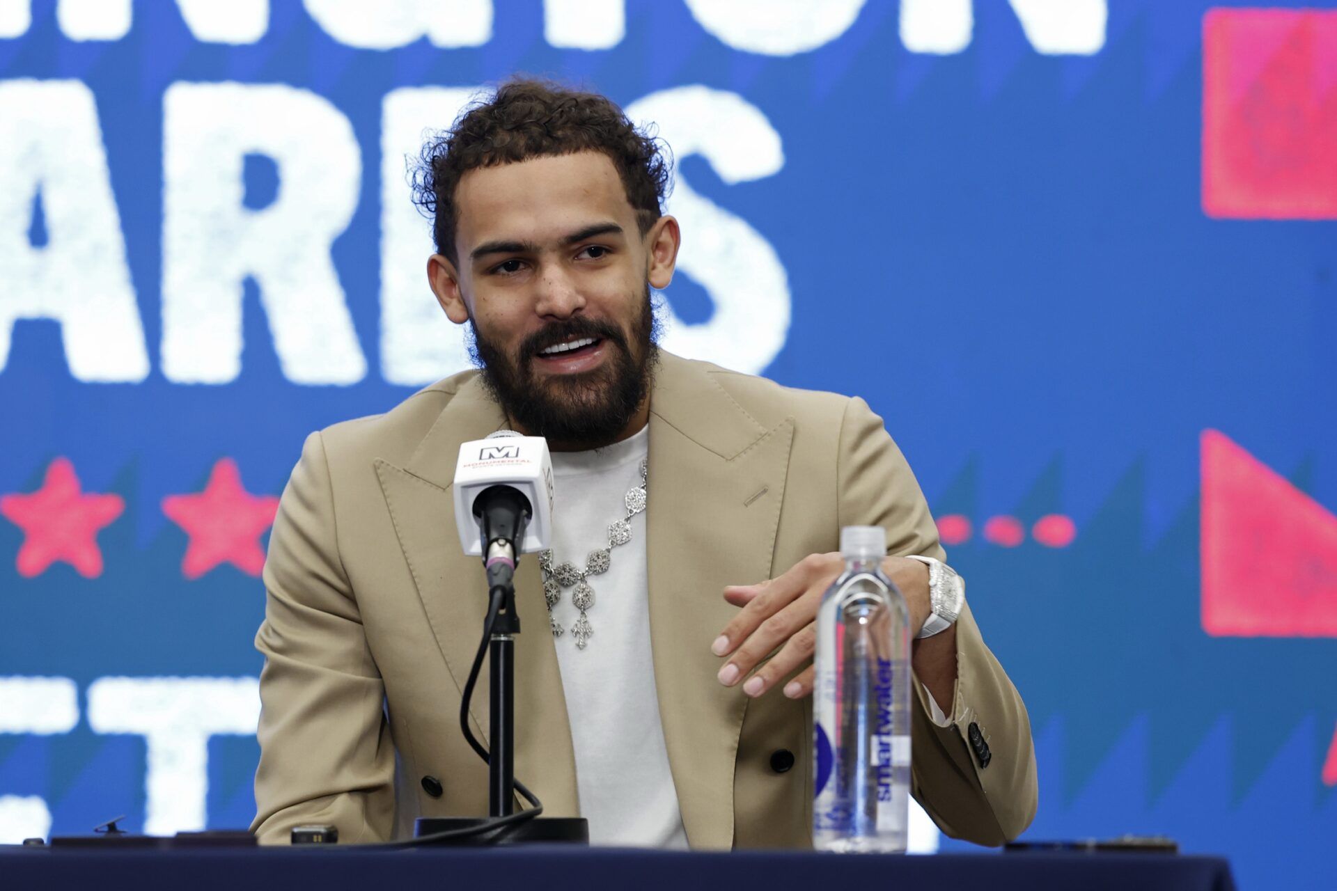 Newly acquired Washington Wizards guard Trae Young speaks at an introductory press conference prior to the Wizards' game against the New Orleans Pelicans at Capital One Arena.