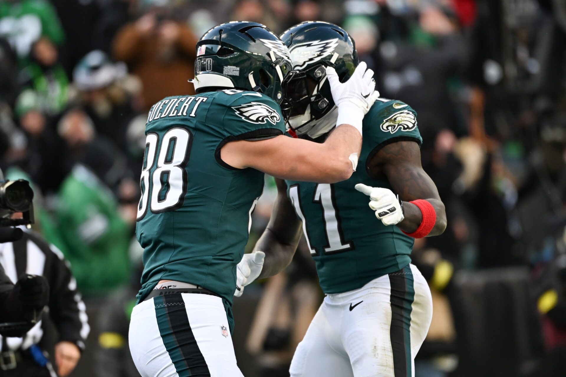 Philadelphia Eagles tight end Dallas Goedert (88) celebrates with wide receiver A.J. Brown (11) after scoring a touchdown against the Las Vegas Raiders during the first quarter at Lincoln Financial Field.