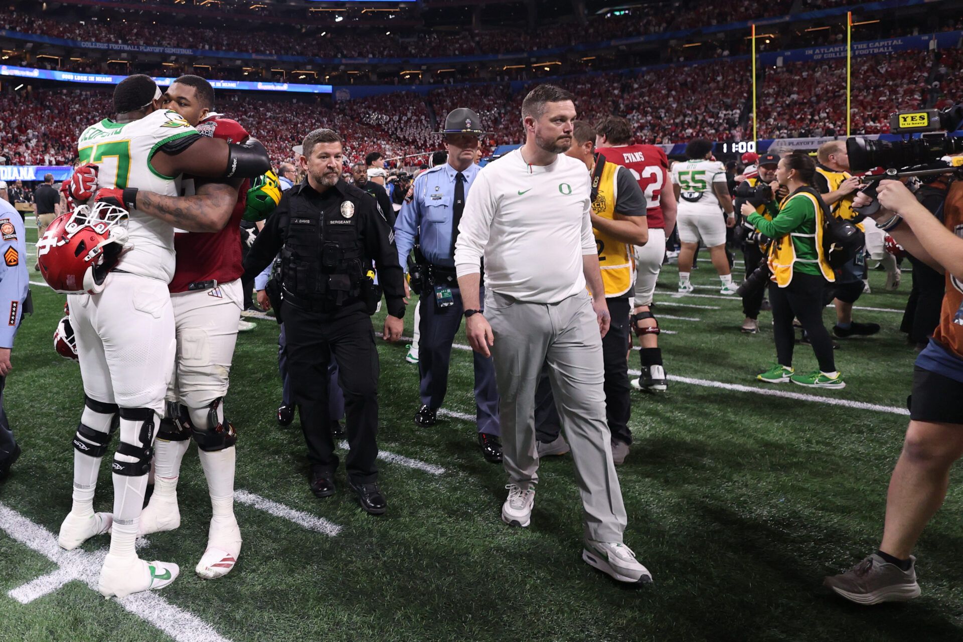 Oregon Ducks head coach Dan Lanning walks off the field after the 2025 Peach Bowl and semifinal game of the College Football Playoff at Mercedes-Benz Stadium.