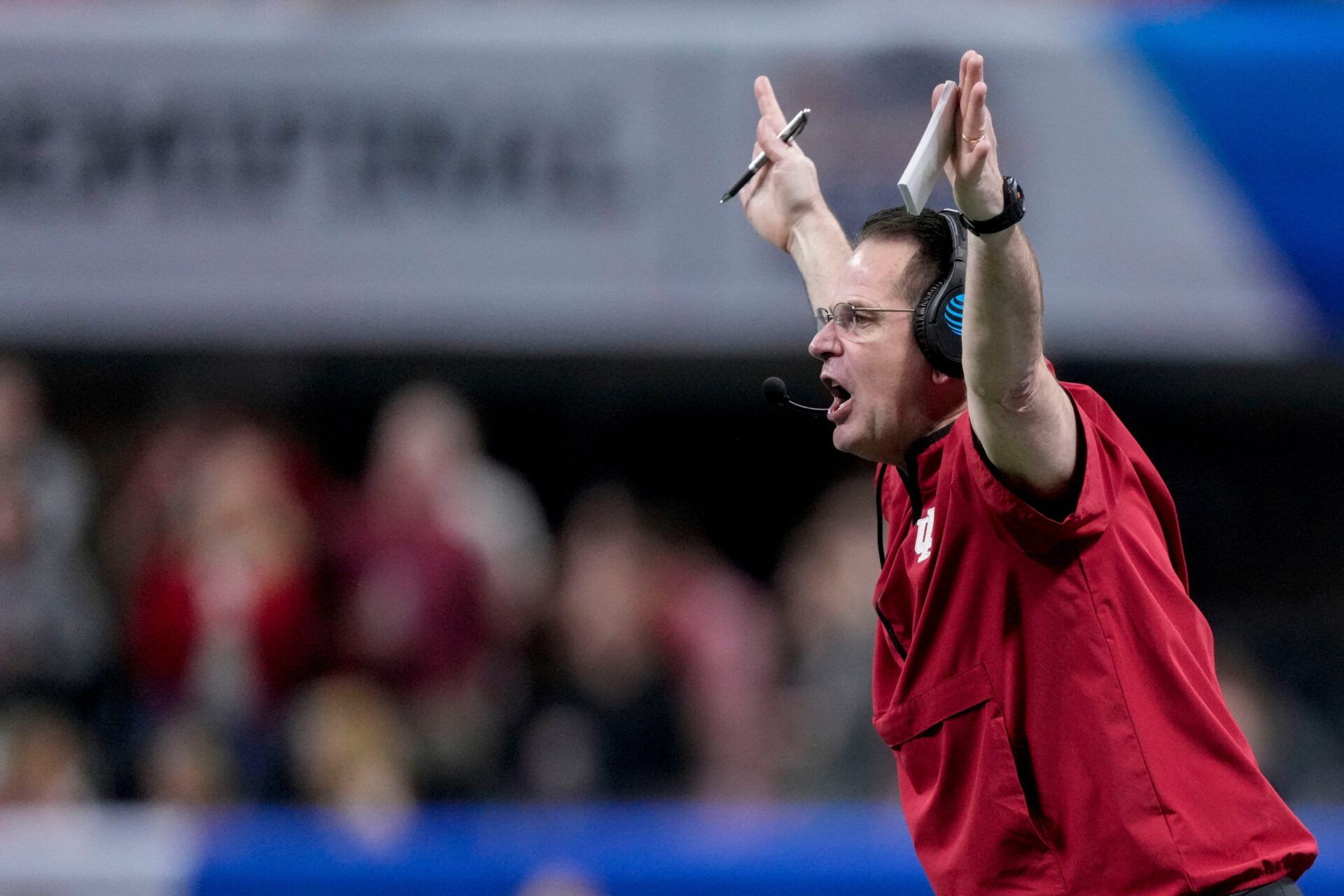 Indiana Hoosiers head coach Curt Cignetti looks for a pass interference call from officials Friday, Jan. 9, 2026, during the Peach Bowl and semifinal game of the College Football Playoff against the Oregon Ducks at Mercedes-Benz Stadium in Atlanta.