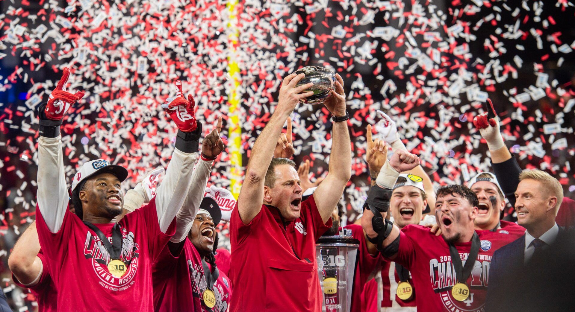 Indiana Head Coach Curt Cignetti and the Hoosies celebrate after the Indiana versus Ohio State Big Ten Championship football game at Lucas Oil Stadium on Saturday, Dec. 6, 2025.