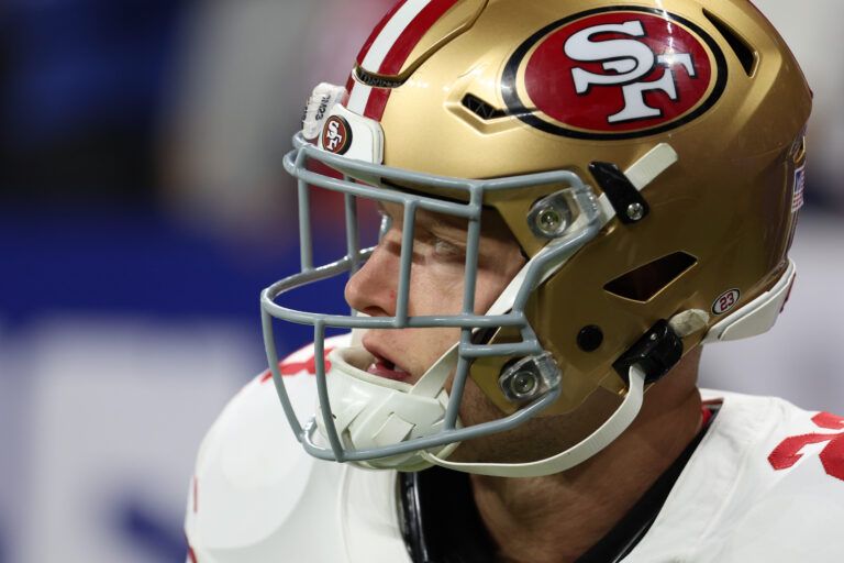 San Francisco 49ers running back Christian McCaffrey (23) looks on before the game against the Indianapolis Colts at Lucas Oil Stadium.