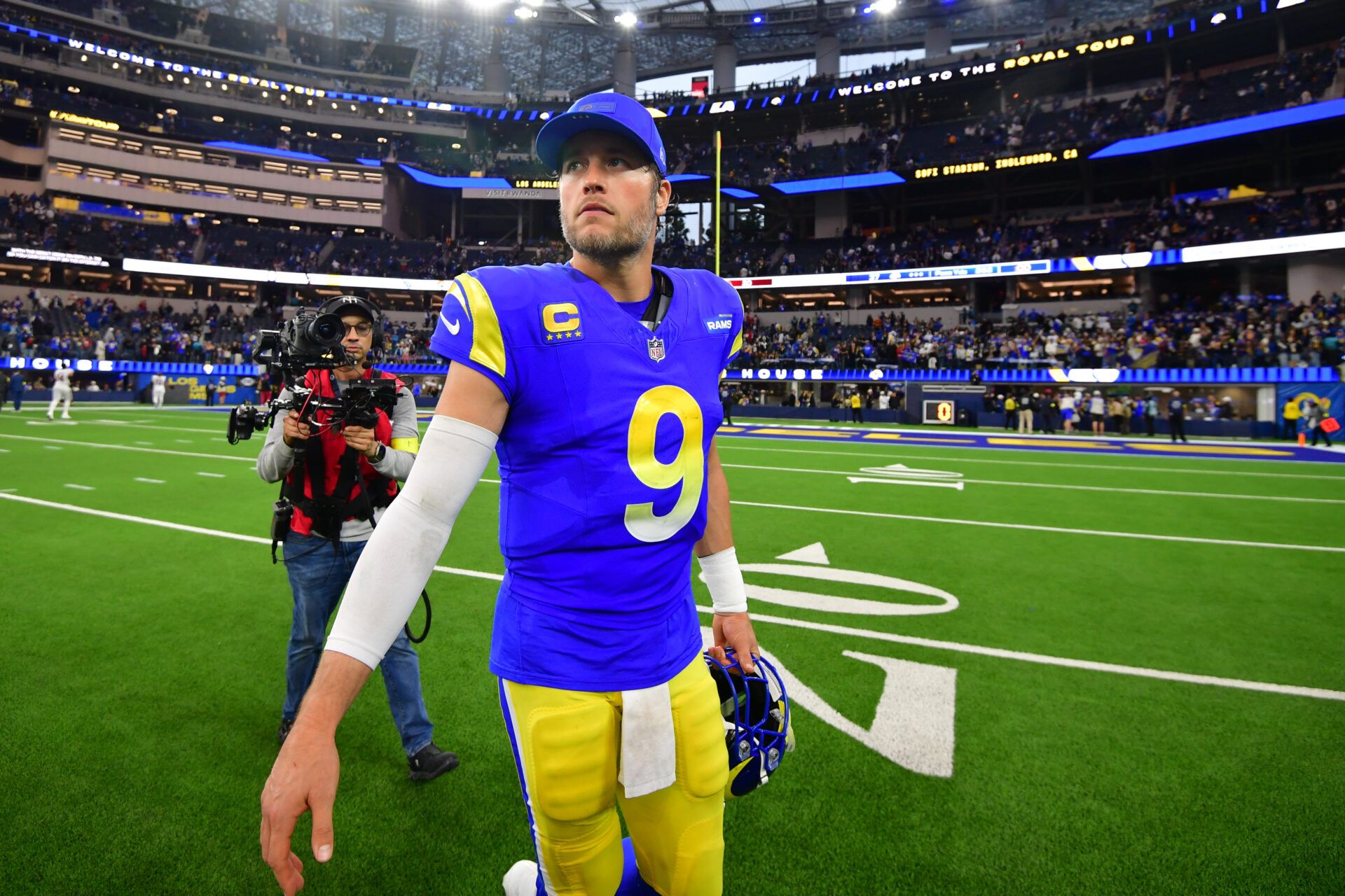 Los Angeles Rams quarterback Matthew Stafford (9) leaves the field following a game against the Arizona Cardinals at SoFi Stadium.