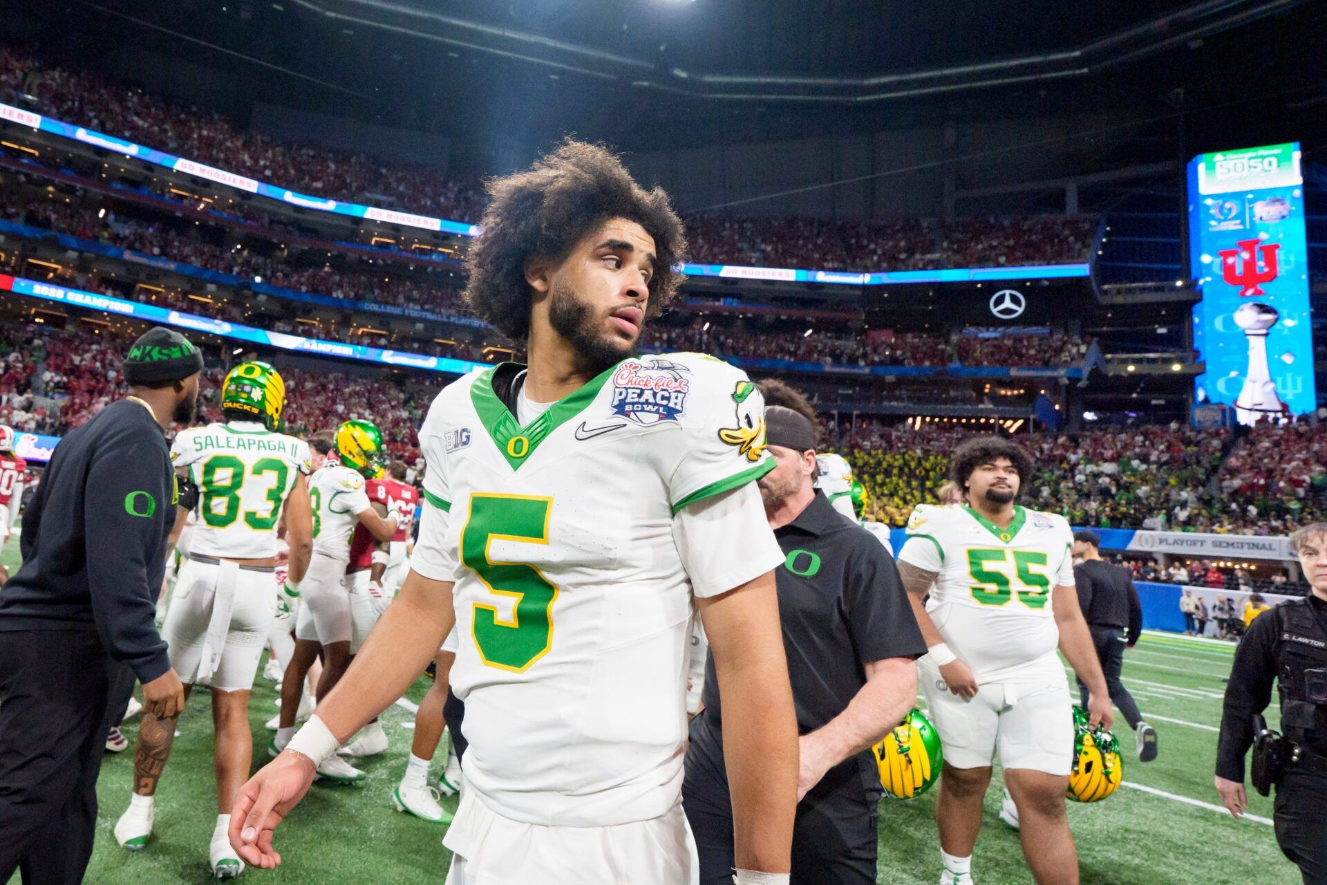Oregon quarterback Dante Moore walks the field after the Ducks’ loss as the Oregon Ducks face the Indiana Hoosiers in the Peach Bowl on Jan. 9, 2026, at Mercedes-Benz Stadium in Atlanta, Georgia.