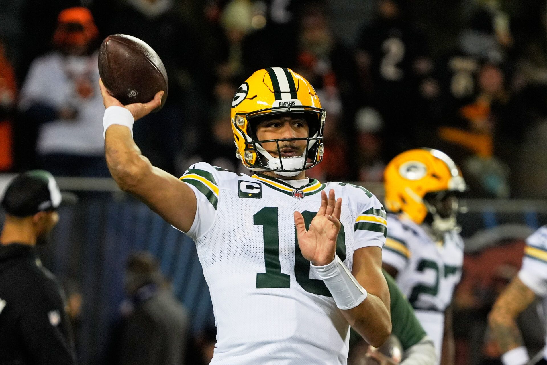 Green Bay Packers quarterback Jordan Love (10) warms up before the game against the Chicago Bears at Soldier Field.