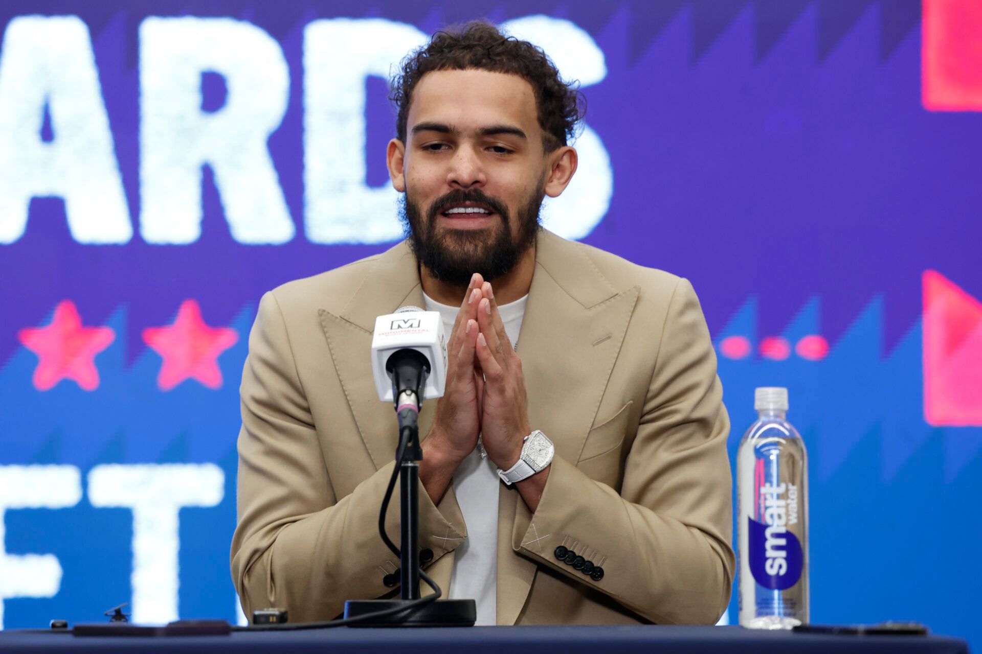 Newly acquired Washington Wizards guard Trae Young speaks at an introductory press conference prior to the Wizards' game against the New Orleans Pelicans at Capital One Arena.