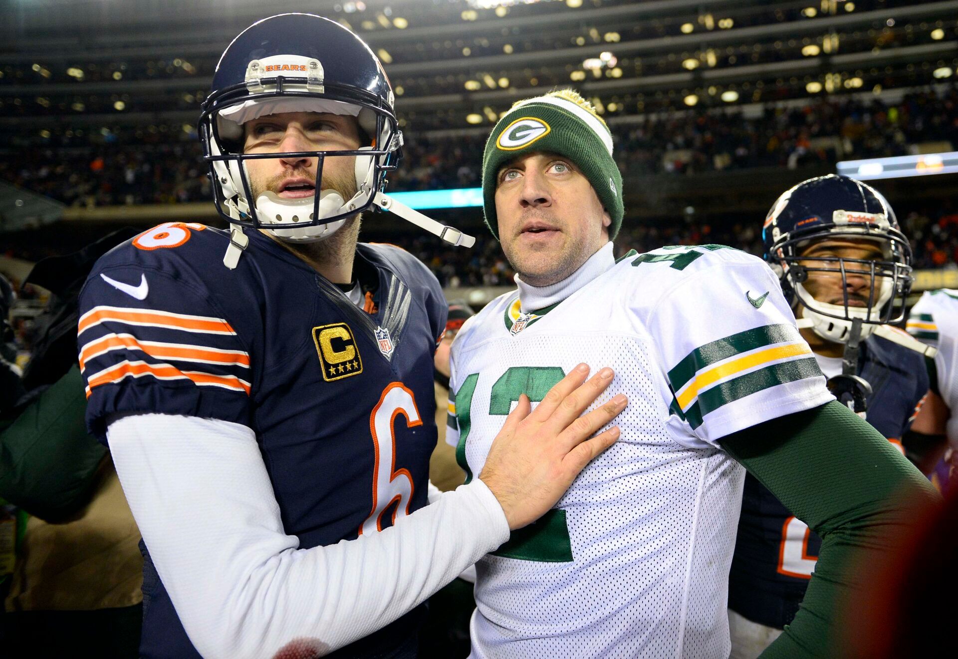Chicago Bears quarterback Jay Cutler (6) and Green Bay Packers quarterback Aaron Rodgers (12) meet at midfield after the game at Soldier Field. The Green Bay Packers win 33-28.
