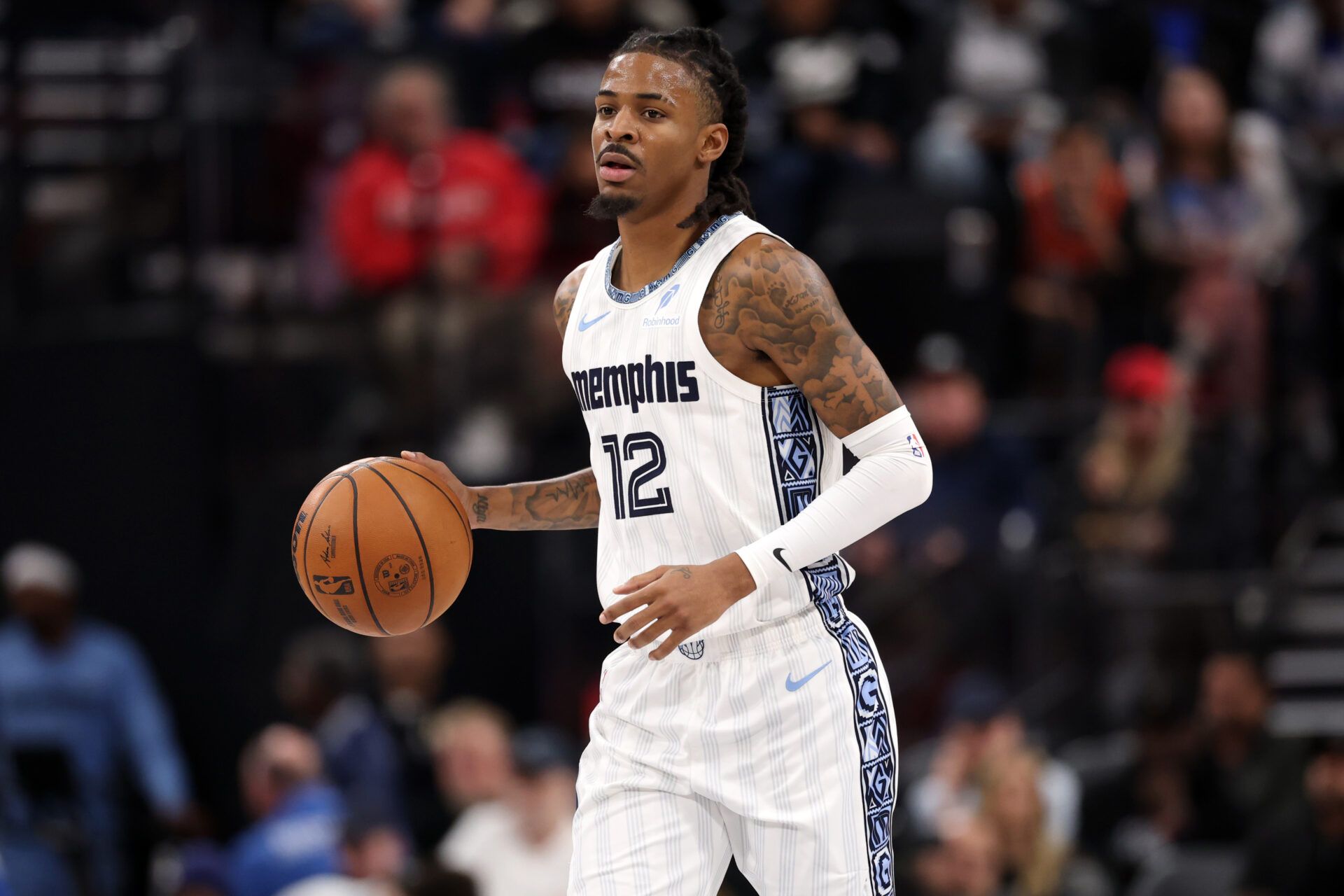 Memphis Grizzlies guard Ja Morant (12) brings the ball up court during the third quarter against the Los Angeles Clippers at Intuit Dome.