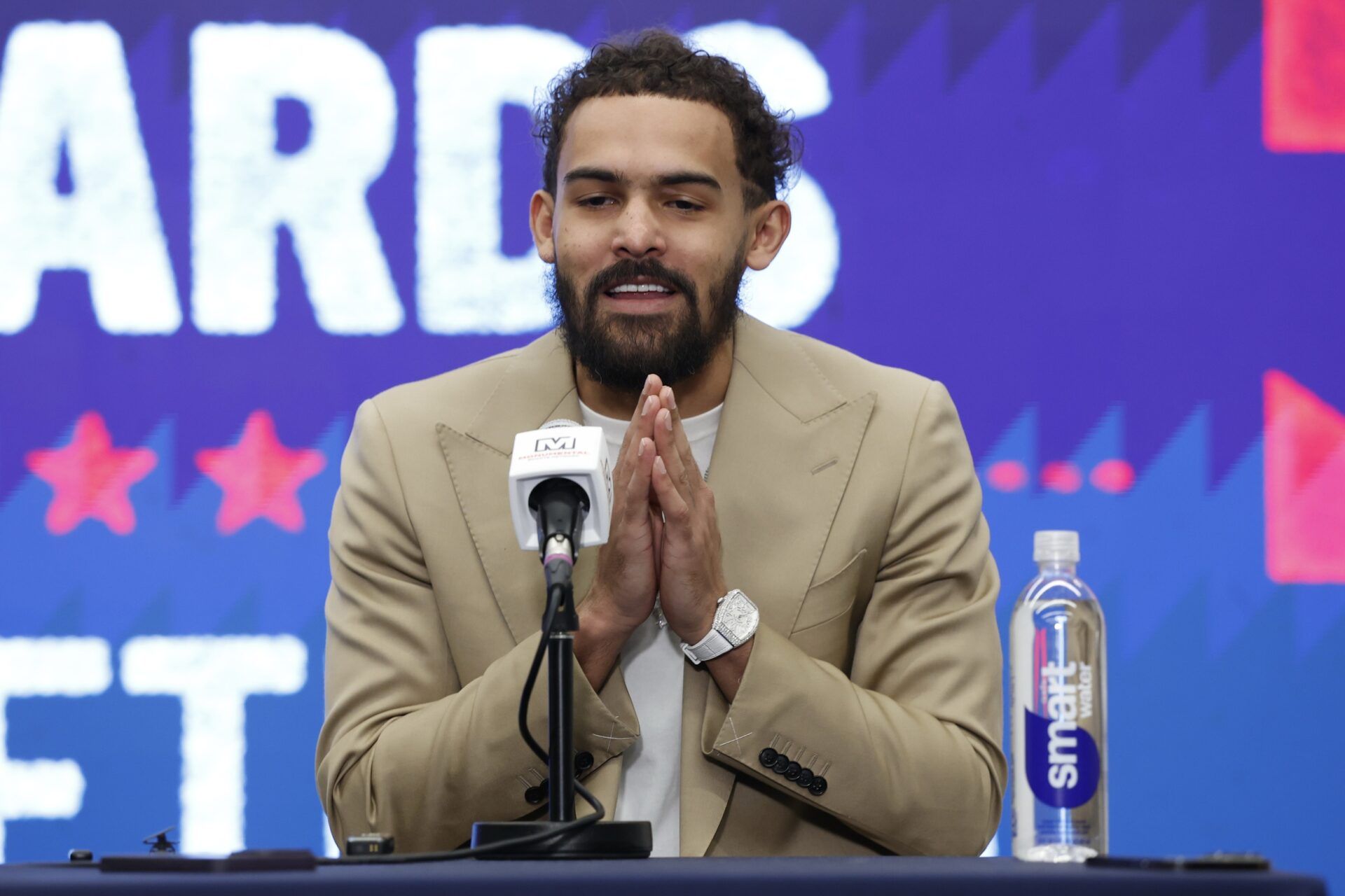 Newly acquired Washington Wizards guard Trae Young speaks at an introductory press conference prior to the Wizards' game against the New Orleans Pelicans at Capital One Arena.