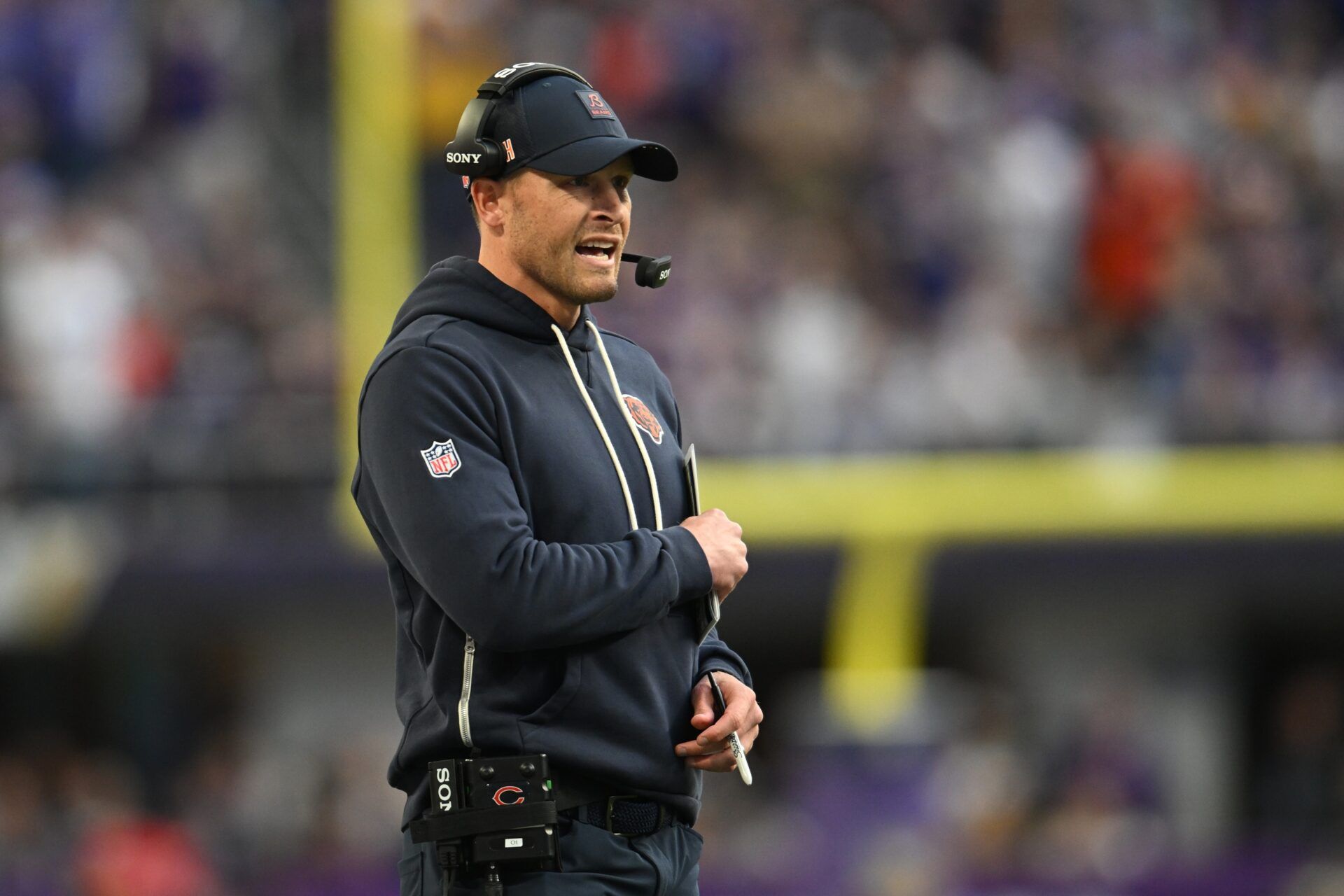 Chicago Bears head coach Ben Johnson stands on the sidelines during the fourth quarter against the Minnesota Vikings at U.S. Bank Stadium.