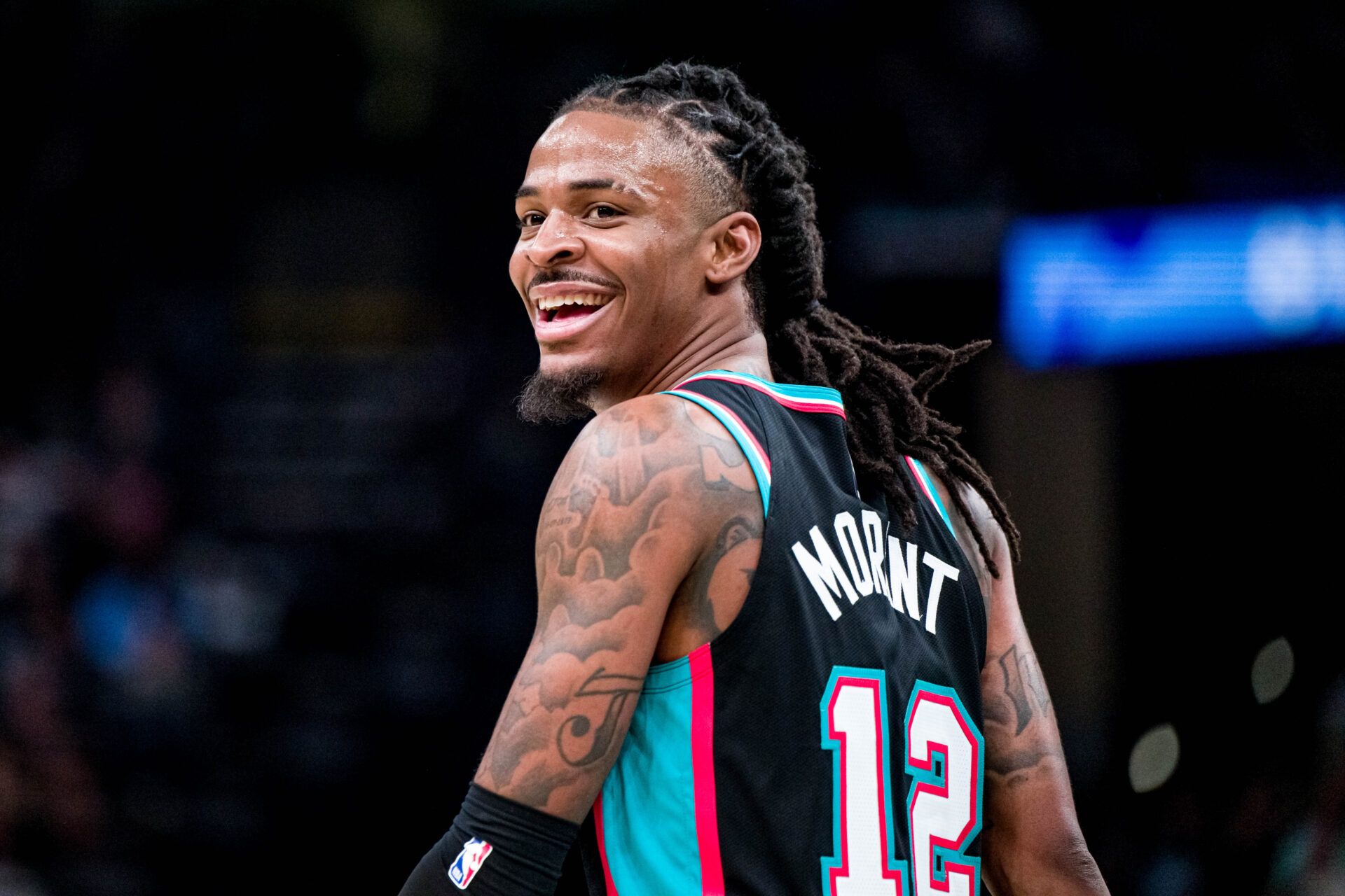 Memphis Grizzlies point guard Ja Morant (12) smiles at the Utah Jazz bench after they call a timeout in the second half at FedExForum.