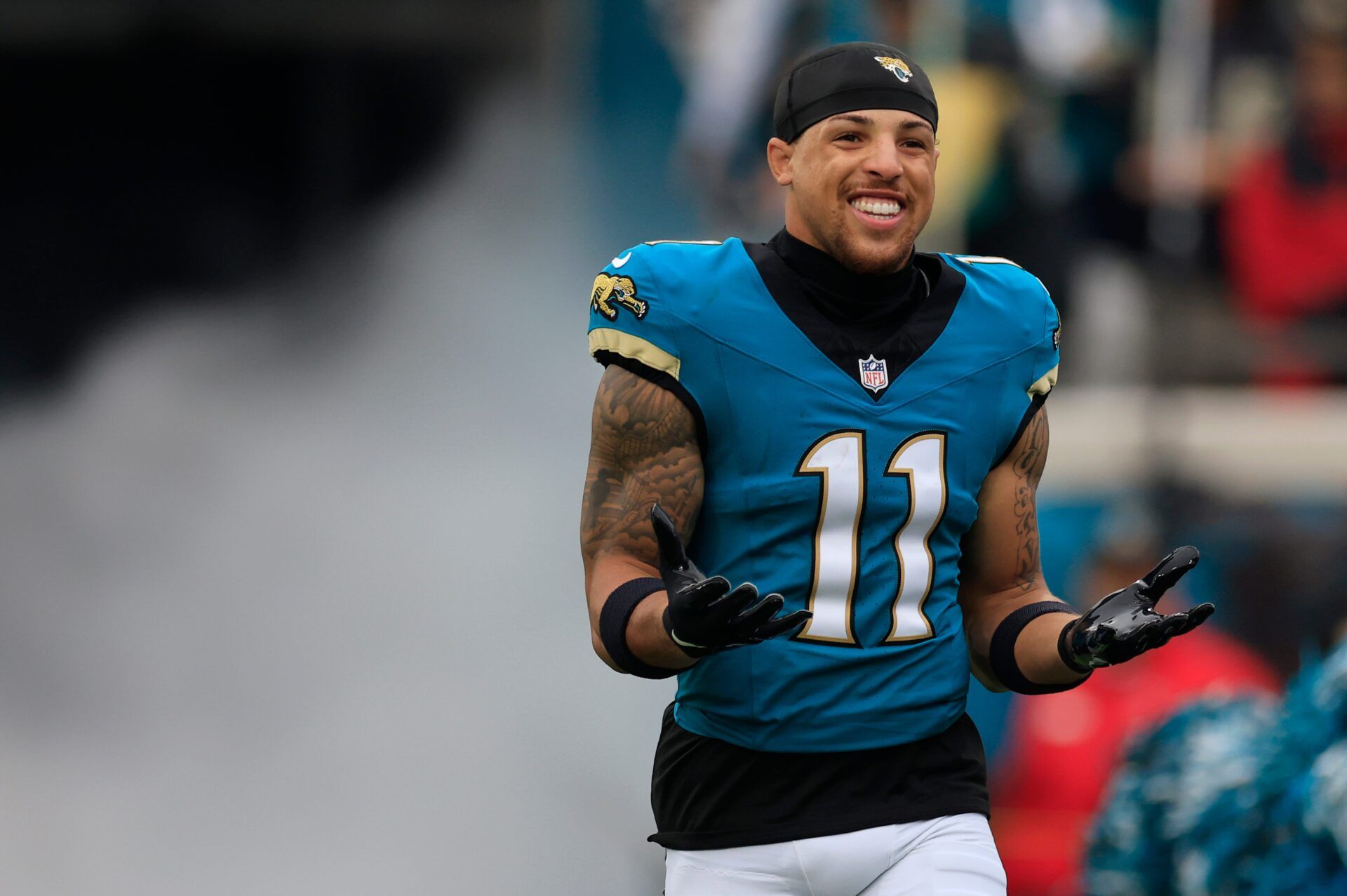 Jacksonville Jaguars wide receiver Parker Washington (11) runs on the field before an NFL football matchup at EverBank Stadium, Sunday, Jan. 4, 2026, in Jacksonville, Fla. The Jaguars defeated the Titans 41-7, capturing the AFC South title. [Corey Perrine/Florida Times-Union]