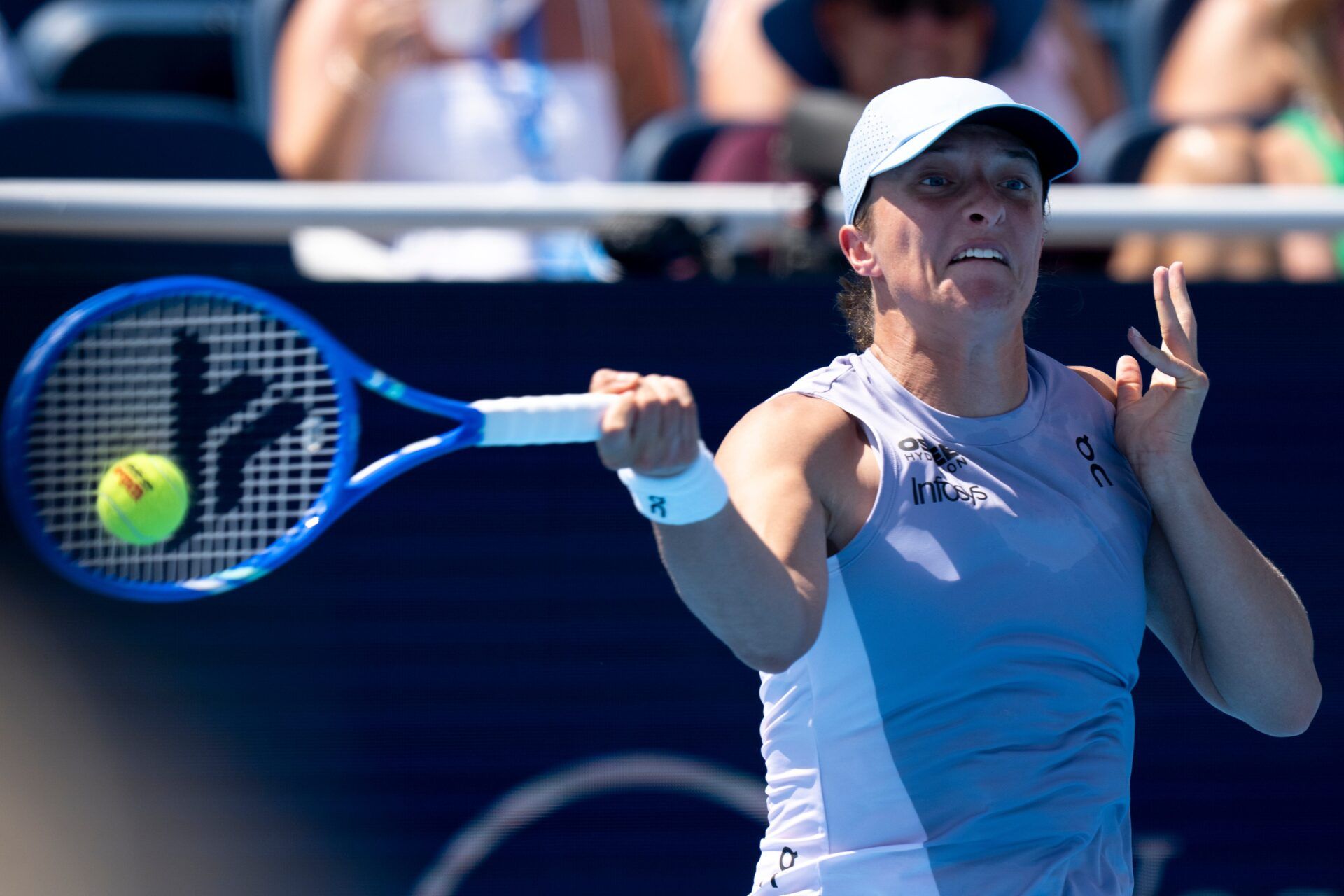 Iga Świątek, of Poland, returns to Anastasia Potapova, of Russia, during the Cincinnati Open at the Lindner Family Tennis Center in Mason, Ohio, on Aug. 9, 2025.