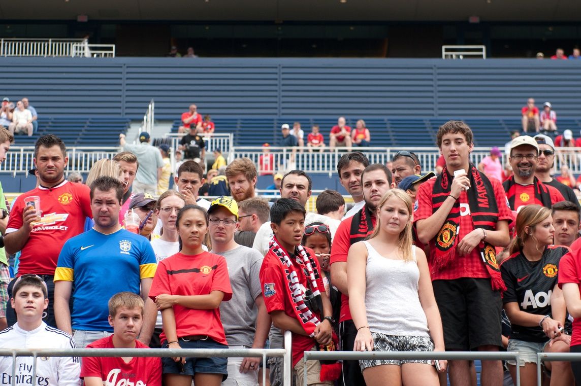 Fans look on at Michigan Stadium prior to the game between the Manchester United and the Real Madrid.