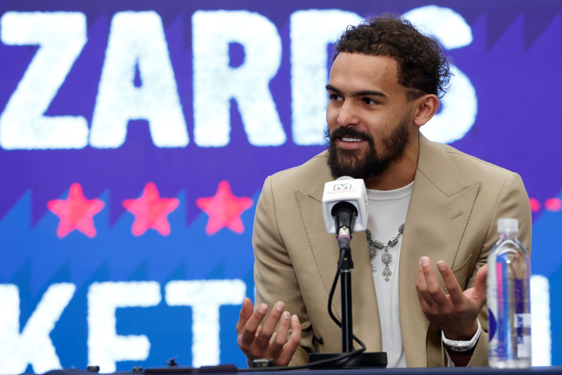 Newly acquired Washington Wizards guard Trae Young speaks at an introductory press conference prior to the Wizards' game against the New Orleans Pelicans at Capital One Arena.