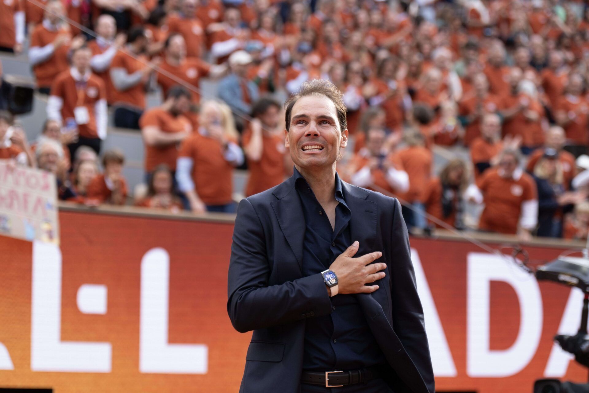 Rafael Nadal of Spain does a final walk around the court during the presentation ceremony paying tribute to his career on a packed Court Philippe Chatrier Courtday on day one at Roland Garros Stadium.