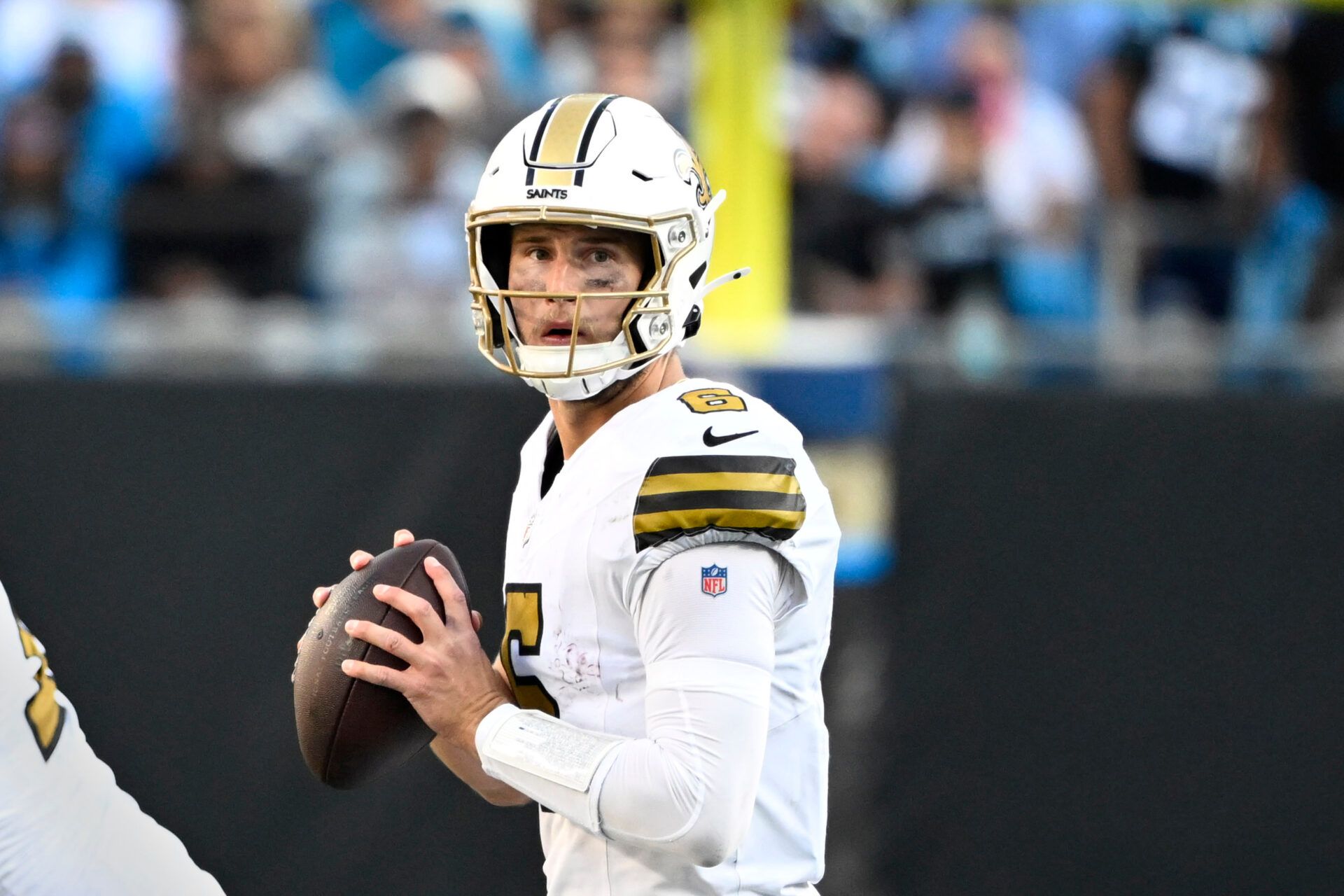 New Orleans Saints quarterback Tyler Shough (6) looks to pass in the fourth quarter at Bank of America Stadium.