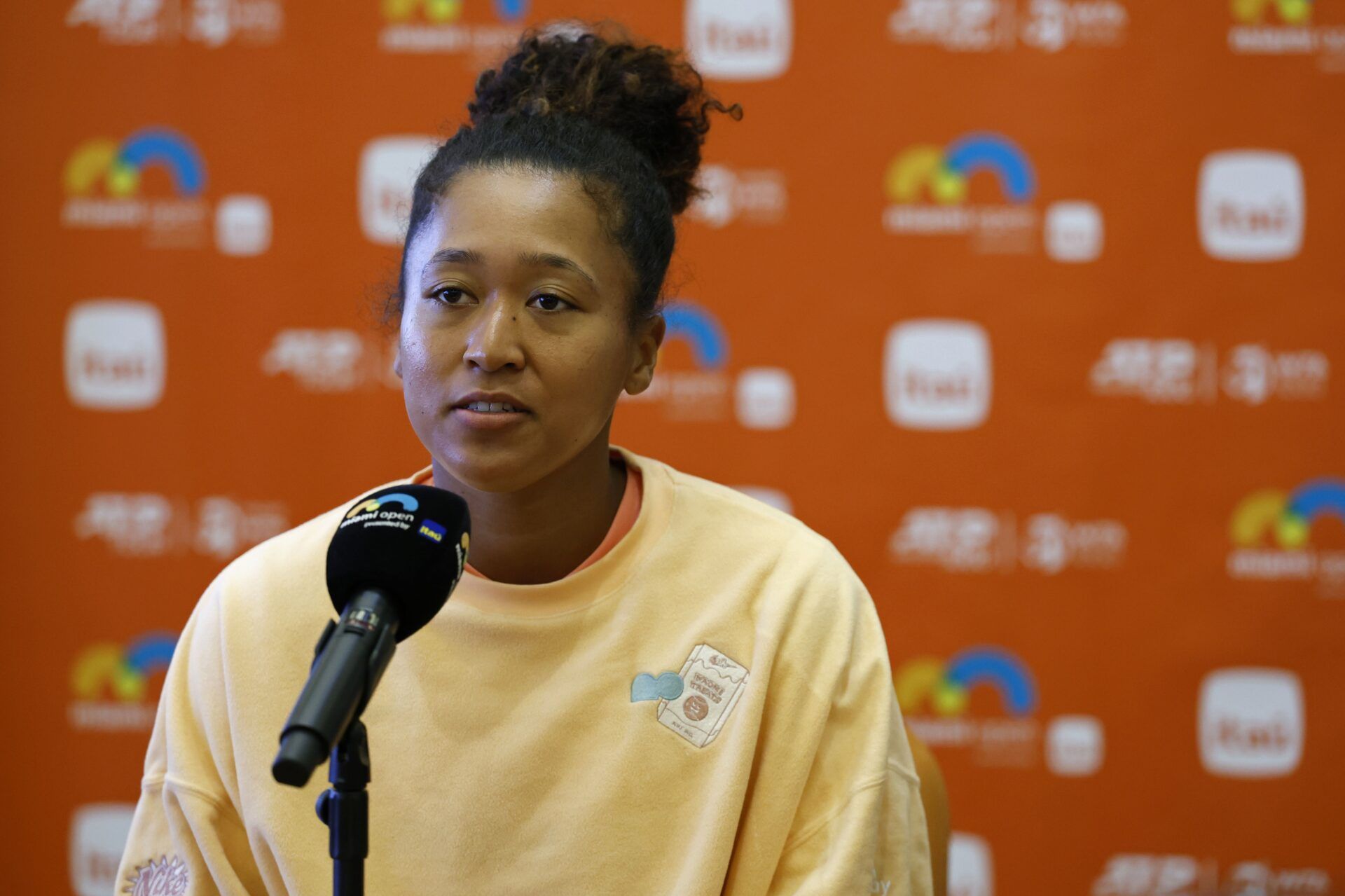 Naomi Osaka (JPN) speaks with the media on day two of the Miami Open at Hard Rock Stadium.