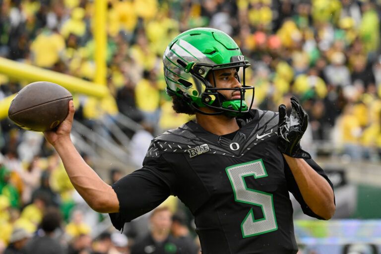 Oregon Ducks quarterback Dante Moore (5) throws a pass before the game against the Indiana Hoosiers at Autzen Stadium.