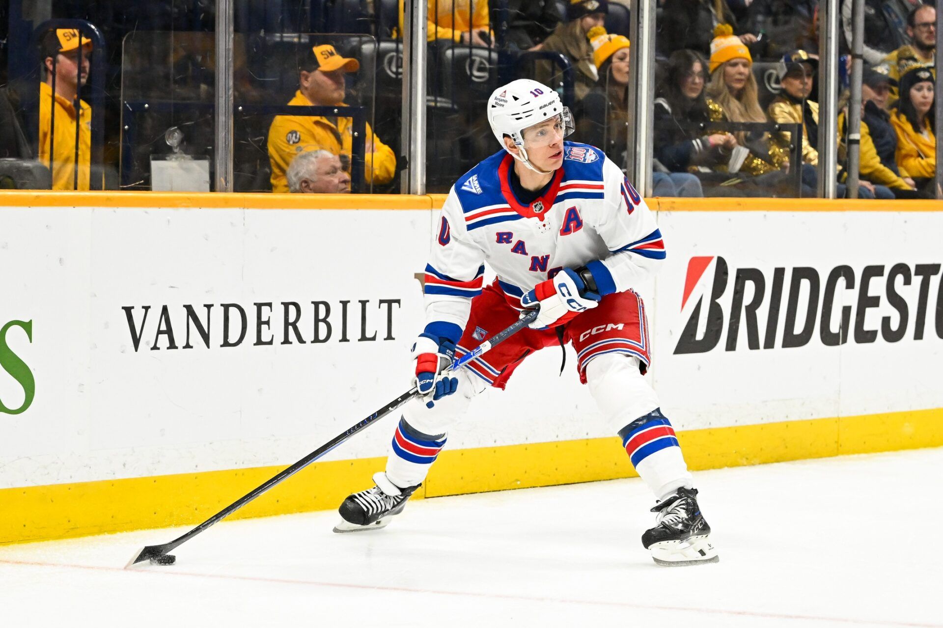 New York Rangers left wing Artemi Panarin (10) skates behind the net against the Nashville Predators during the second period at Bridgestone Arena.