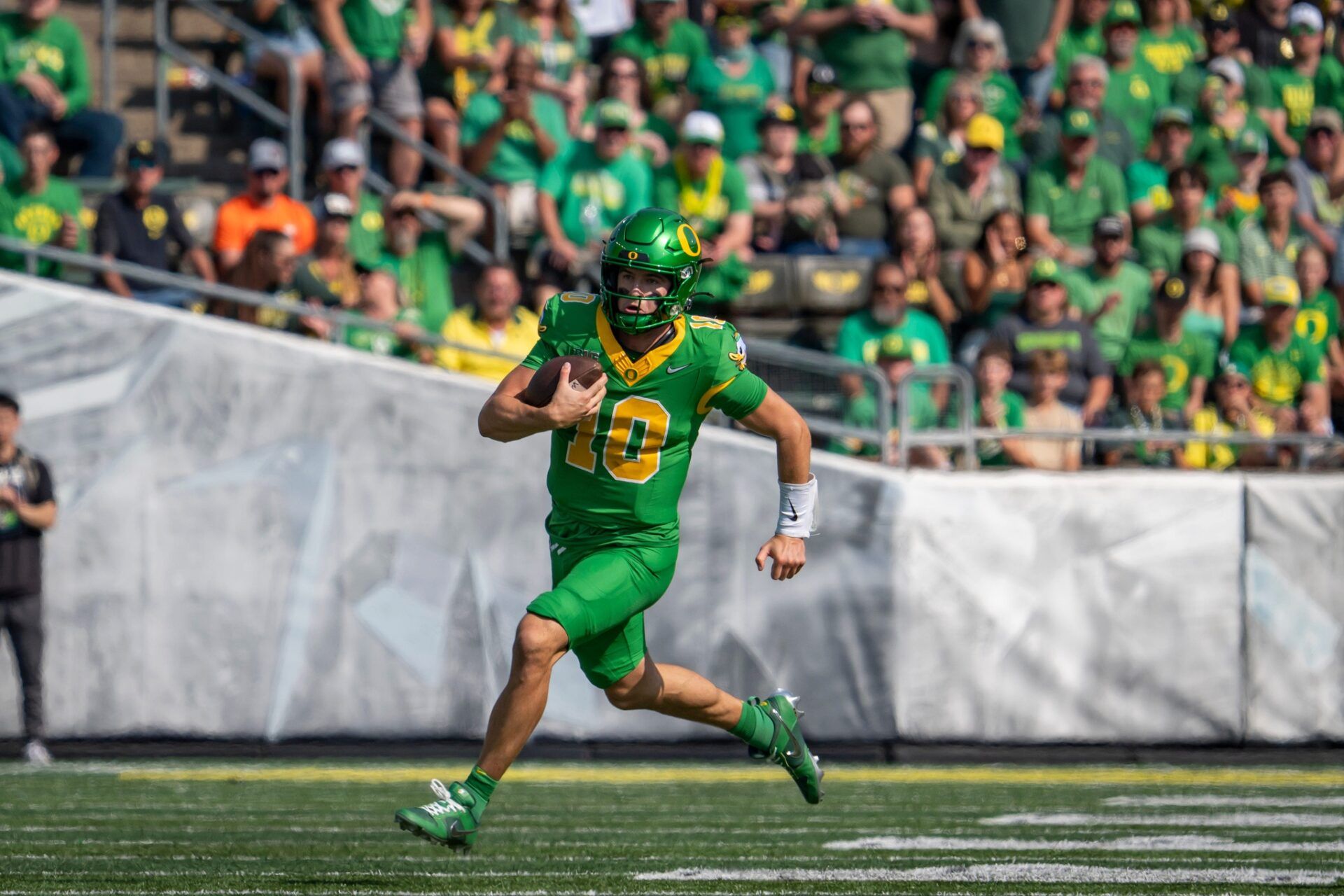 Oregon quarterback Luke Moga finds room to run as the Oregon Ducks host the Oklahoma State Cowboys on Sept. 6, 2025, at Autzen Stadium in Eugene, Oregon.