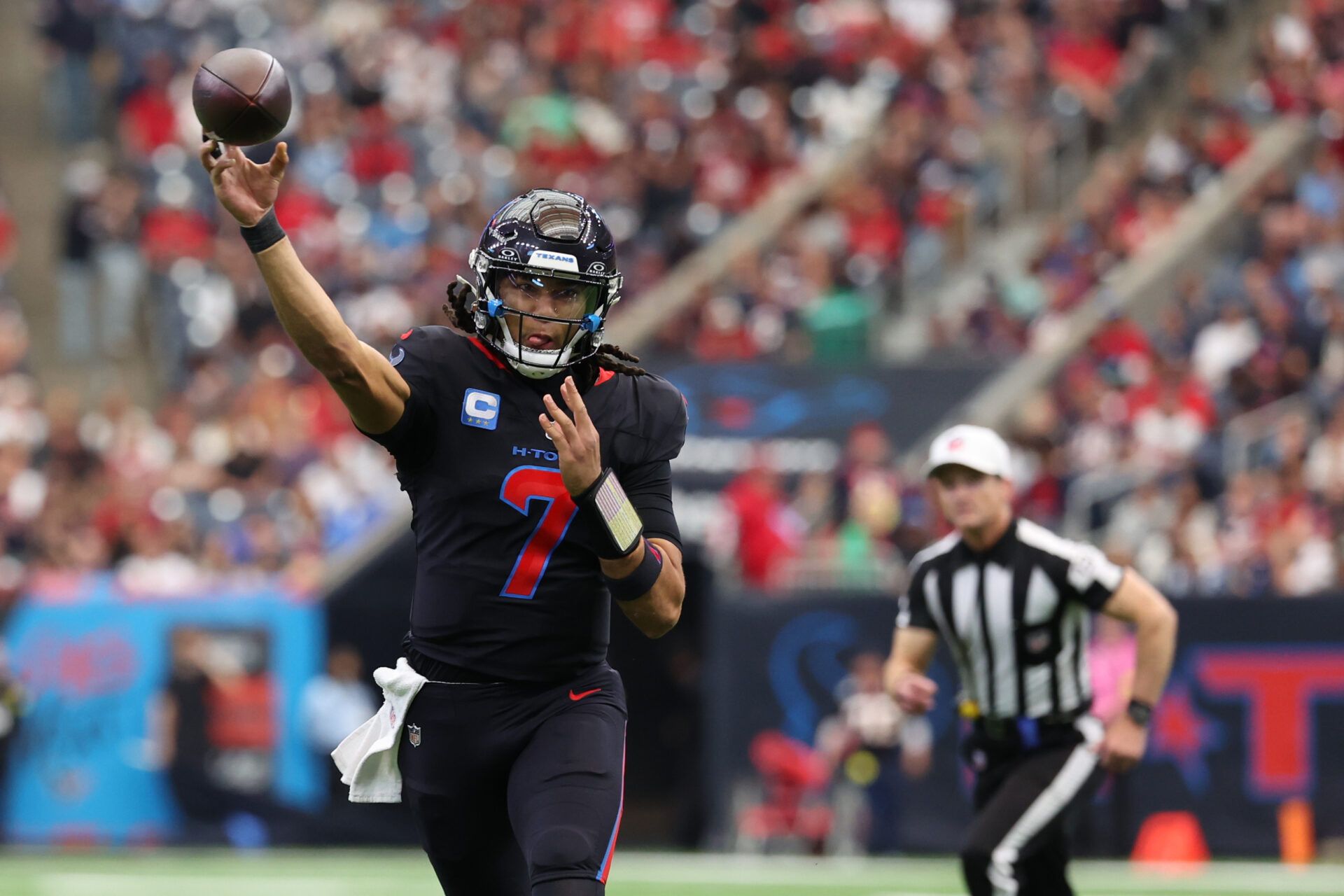 Houston Texans quarterback C.J. Stroud (7) throws downfield against the Indianapolis Colts during the first half at NRG Stadium.