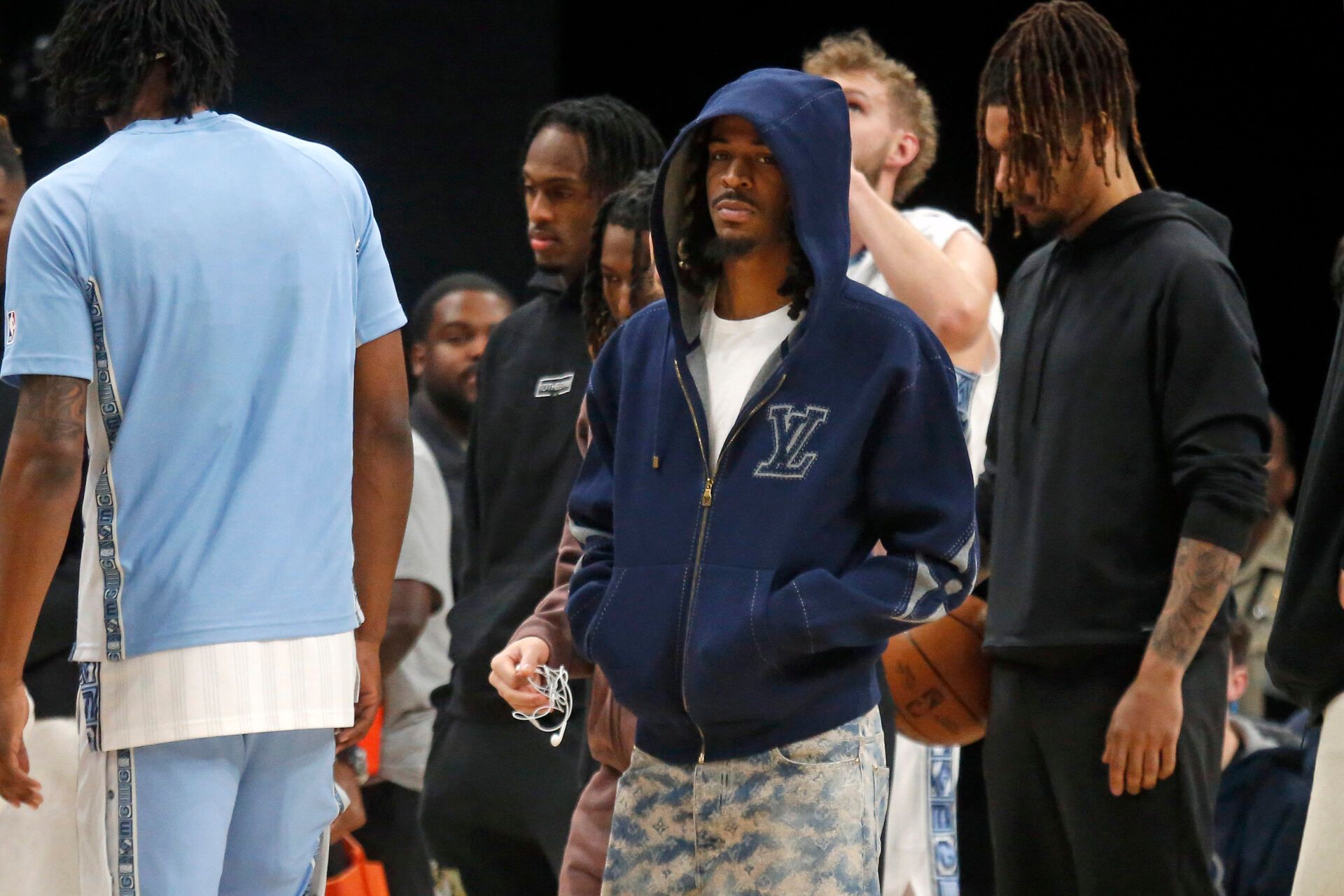 Memphis Grizzlies guard Ja Morant (12) looks on during a timeout during the first quarter against the Brooklyn Nets at FedExForum.