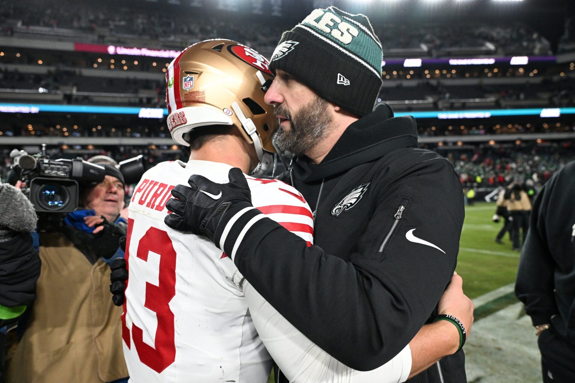 Philadelphia Eagles head coach Nick Sirianni speaks to San Francisco 49ers quarterback Brock Purdy (13) after an NFC Wild Card Round game at Lincoln Financial Field.