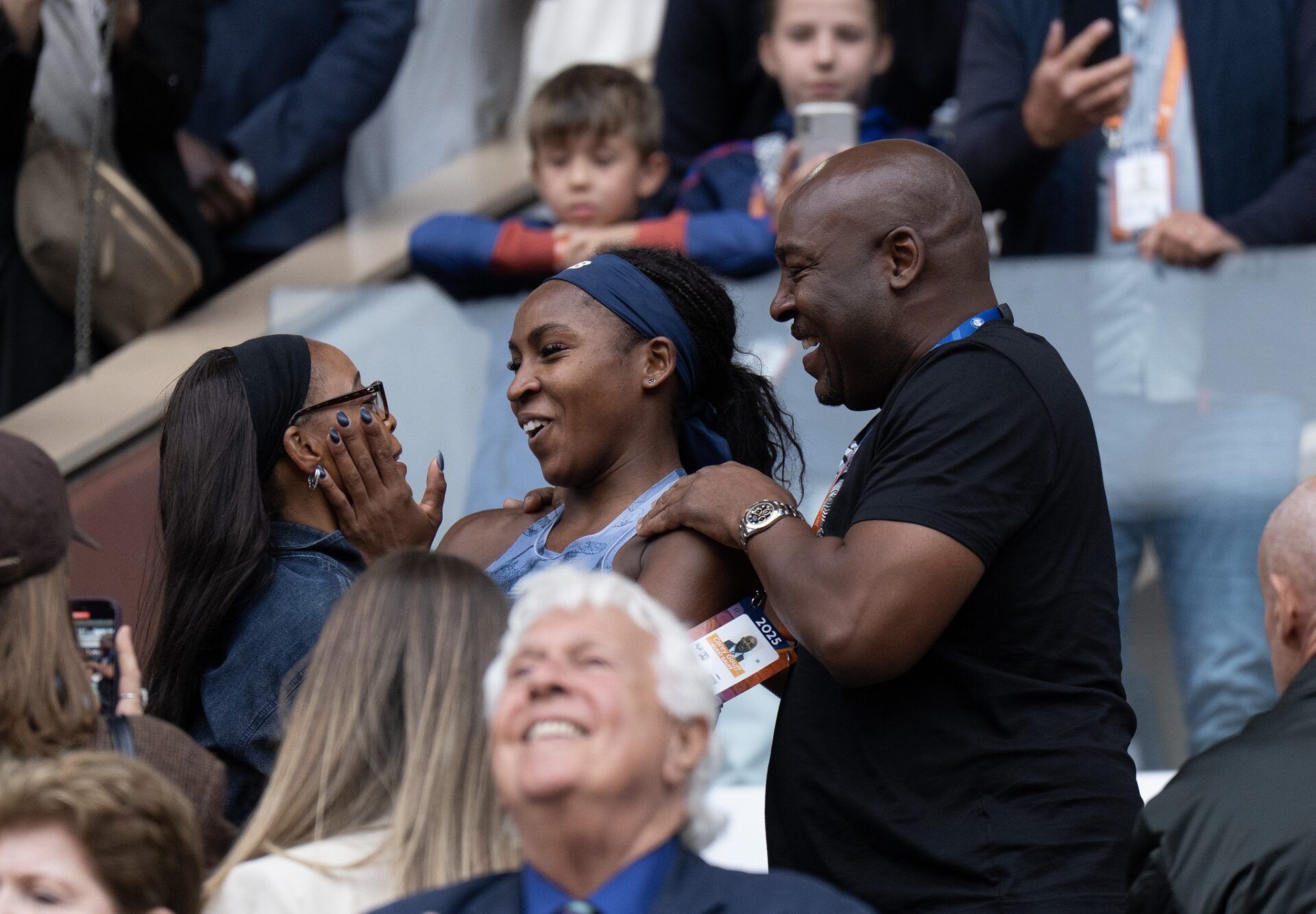 Coco Gauff of the United States celebrates with her parents, Candi and Corey Gauff, after winning the womenÕs singles final against Aryna Sabalenka on day 14 at Roland Garros Stadium.