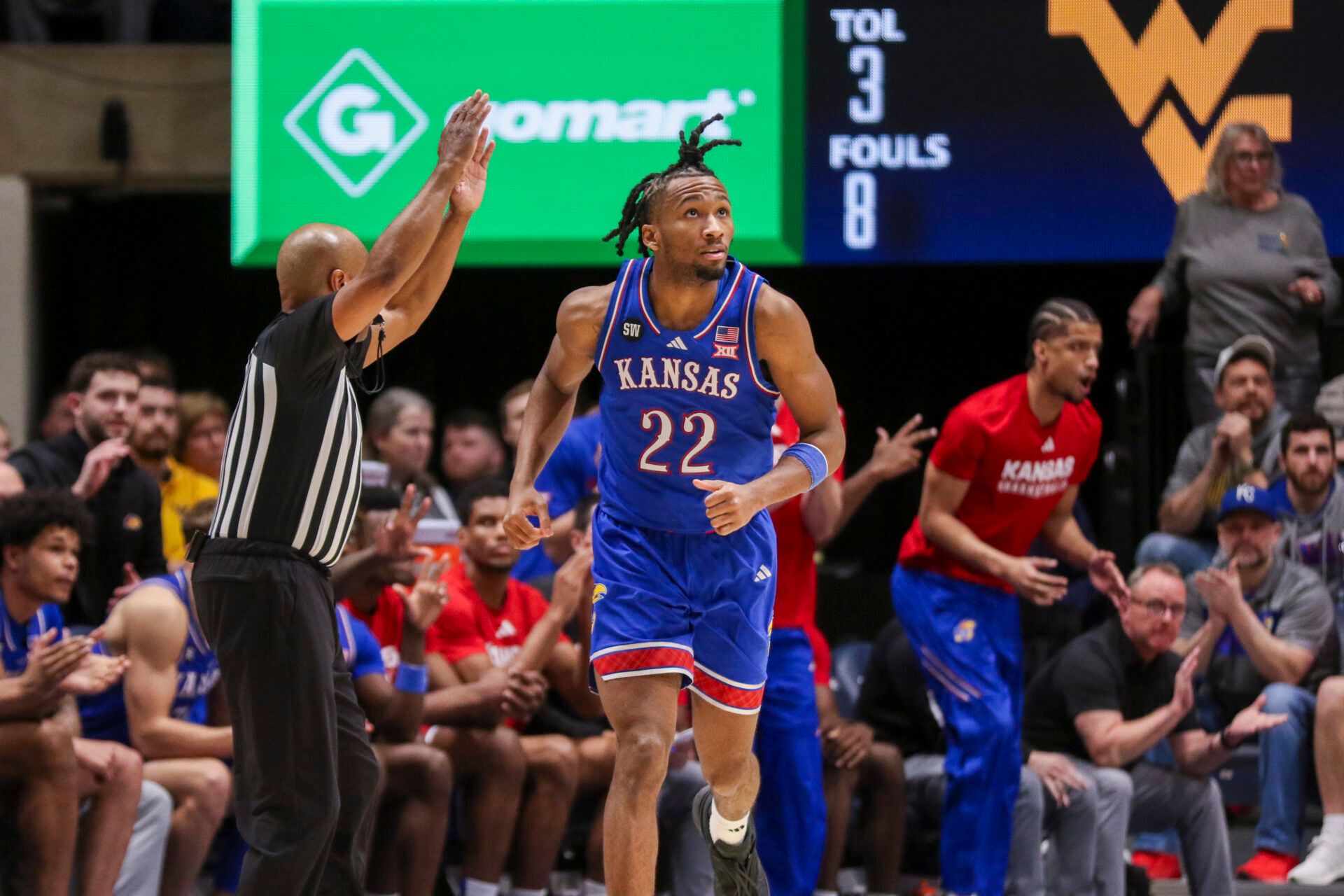 Kansas Jayhawks guard Darryn Peterson (22) celebrates after a three point basket during the second half against the West Virginia Mountaineers at Hope Coliseum.