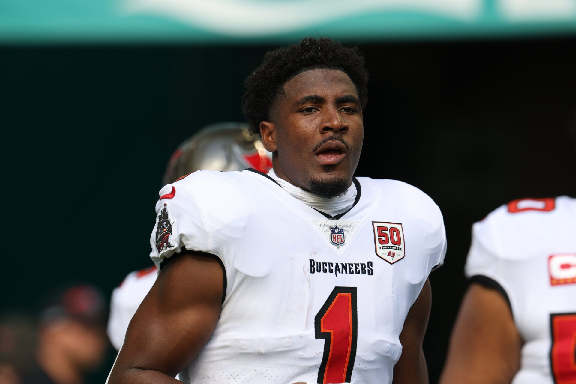 Tampa Bay Buccaneers running back Rachaad White (1) runs out for player introductions prior to a game against the Miami Dolphins at Hard Rock Stadium.