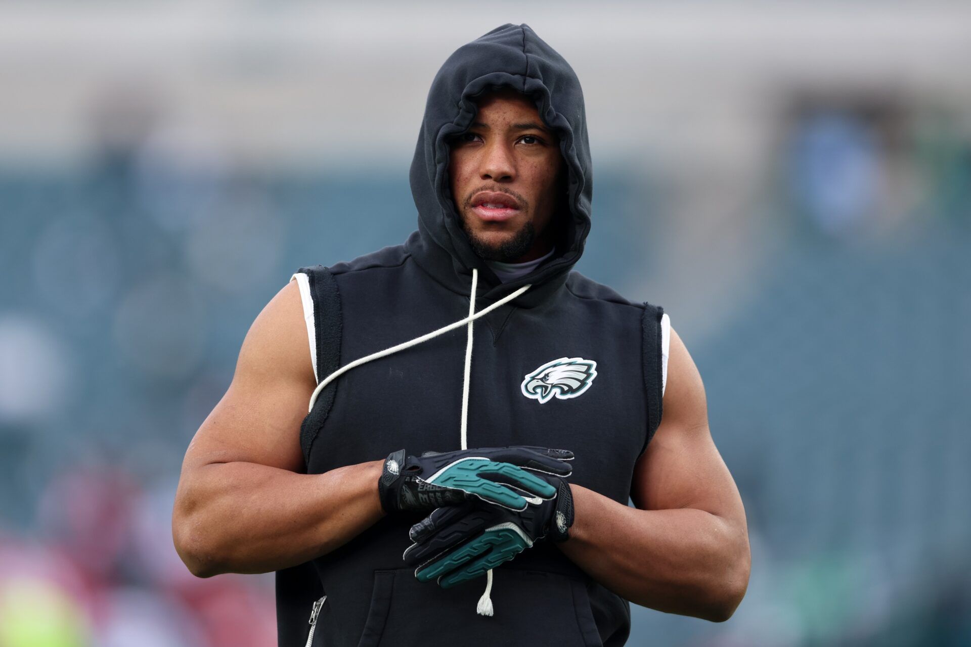 Philadelphia Eagles running back Saquon Barkley (26) looks on during warmups prior to an NFC Wild Card Round game against the San Francisco 49ers at Lincoln Financial Field.