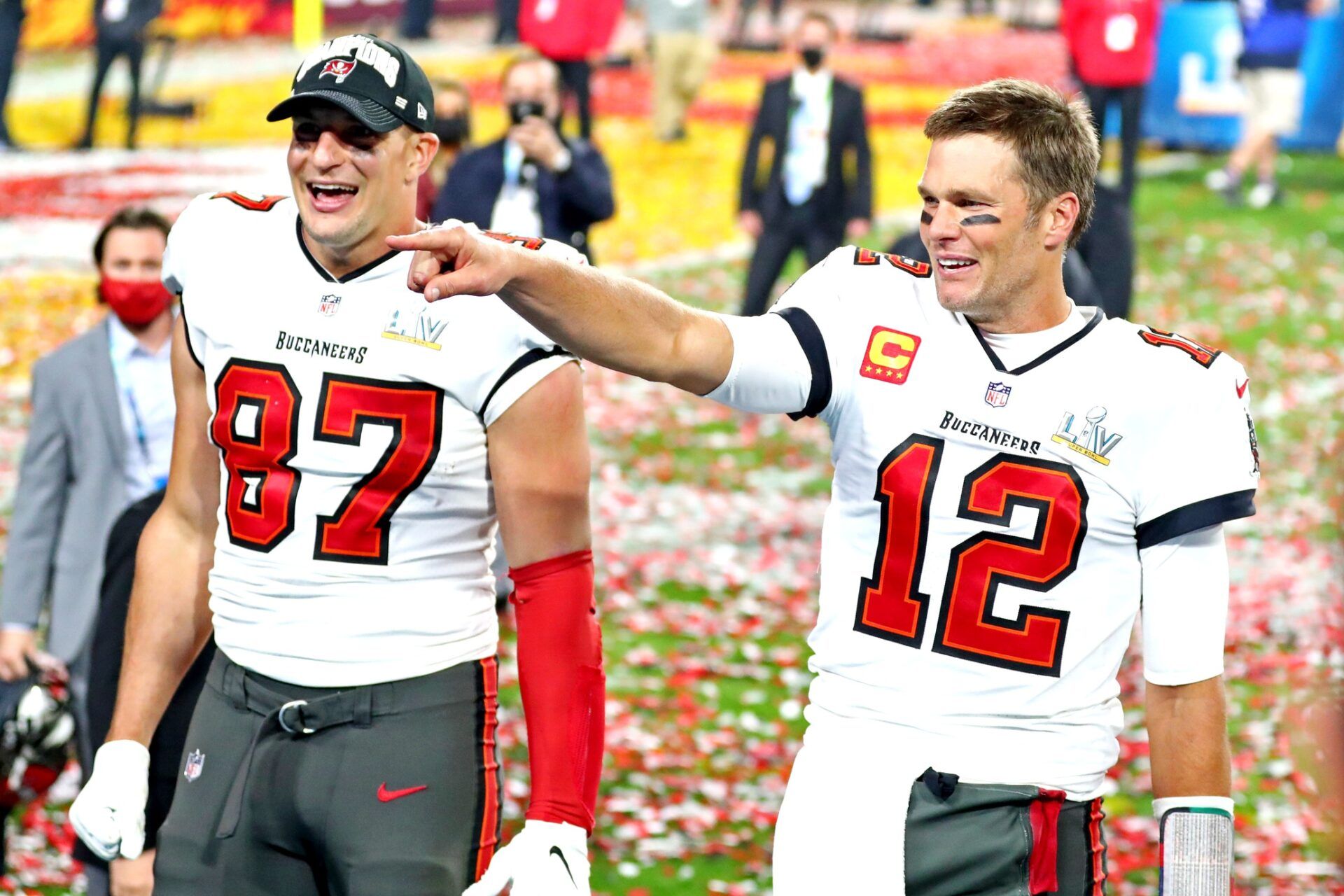 Tampa Bay Buccaneers quarterback Tom Brady (12) and tight end Rob Gronkowski (87) celebrate after beating the Kansas City Chiefs in Super Bowl LV at Raymond James Stadium.