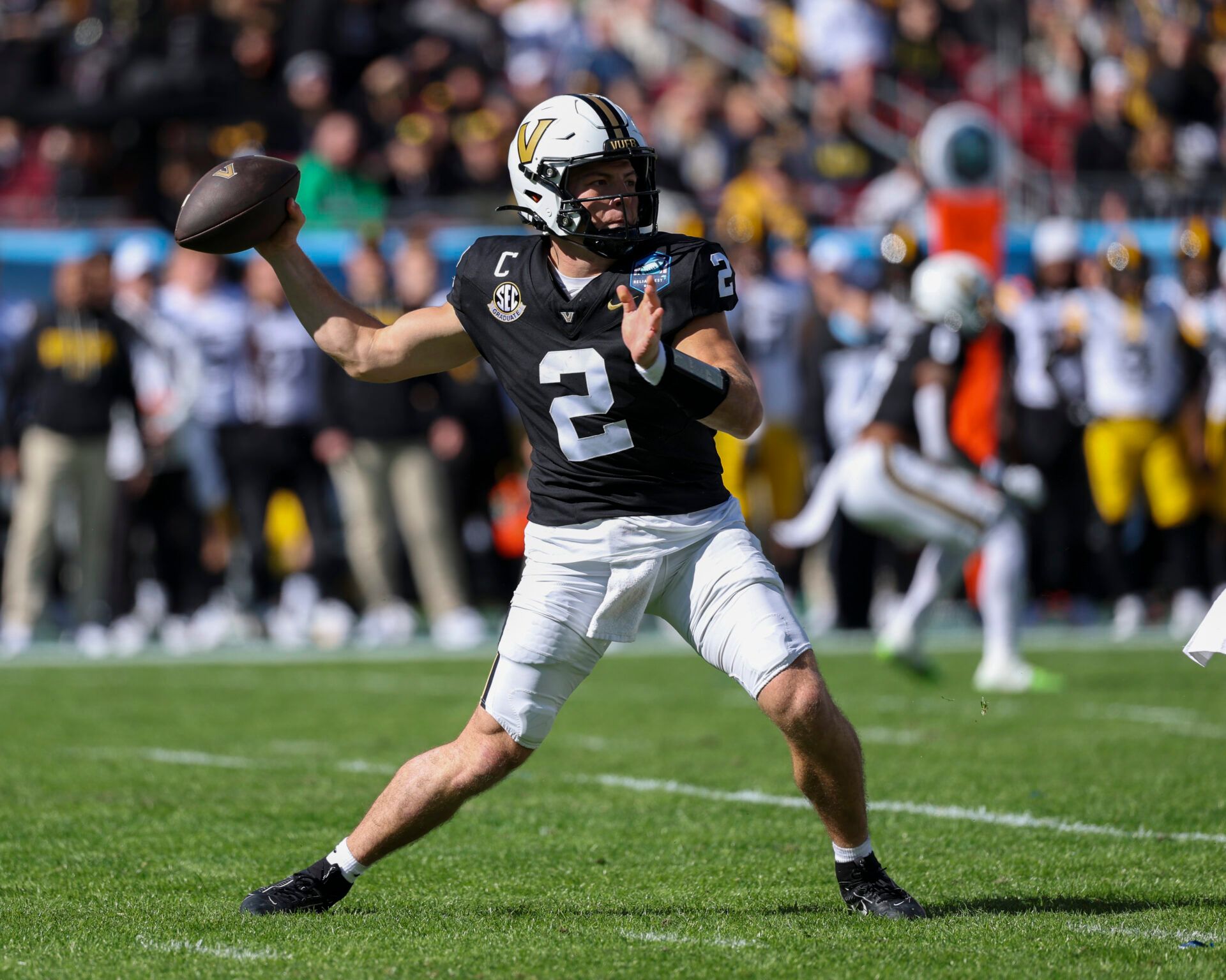 Vanderbilt Commodores quarterback Diego Pavia (2) throws a pass against the Iowa Hawkeyes in the first quarter during the ReliaQuest Bowl at Raymond James Stadium.