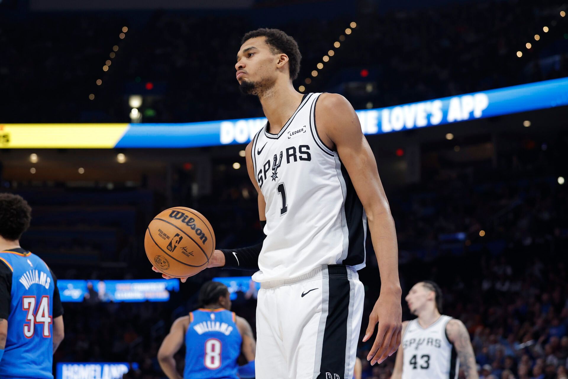 San Antonio Spurs forward/center Victor Wembanyama (1) walks off the court during a time out against the Oklahoma City Thunder during the second half at Paycom Center.