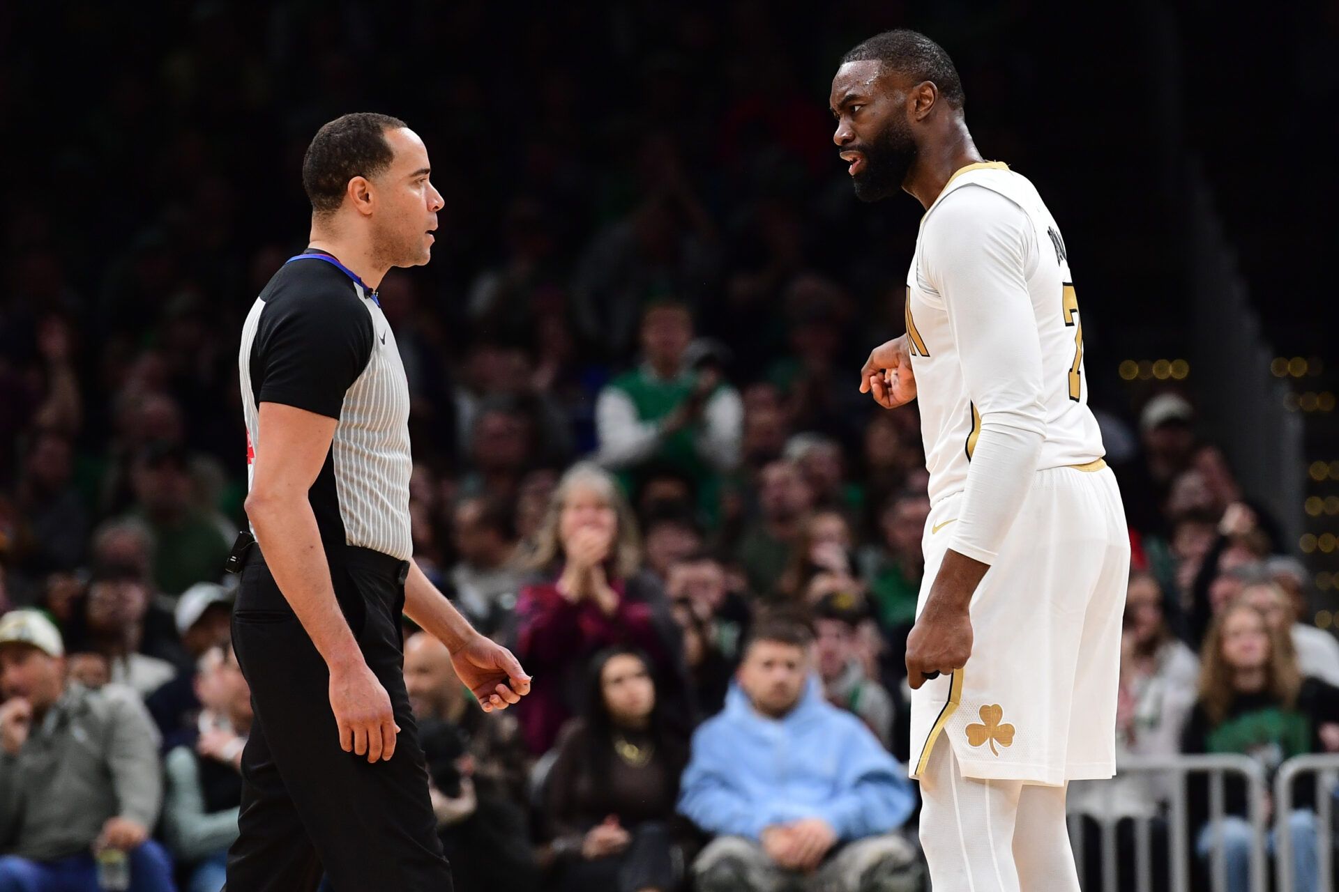 Boston Celtics guard Jaylen Brown (7) has words with an official during the second half against the Denver Nuggets at TD Garden.