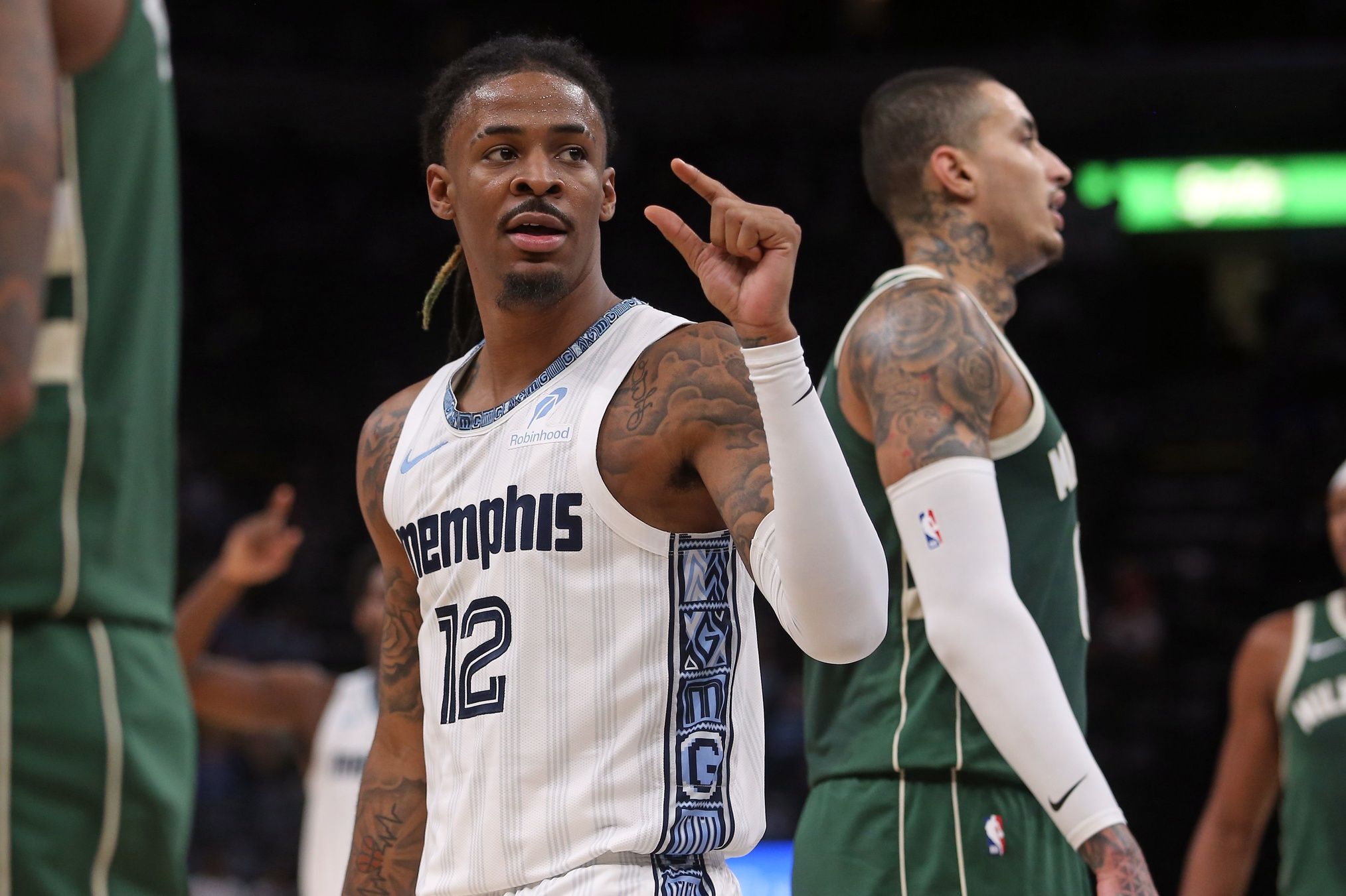 Memphis Grizzlies guard Ja Morant (12) gestures during the third quarter against the Milwaukee Bucks at FedExForum.