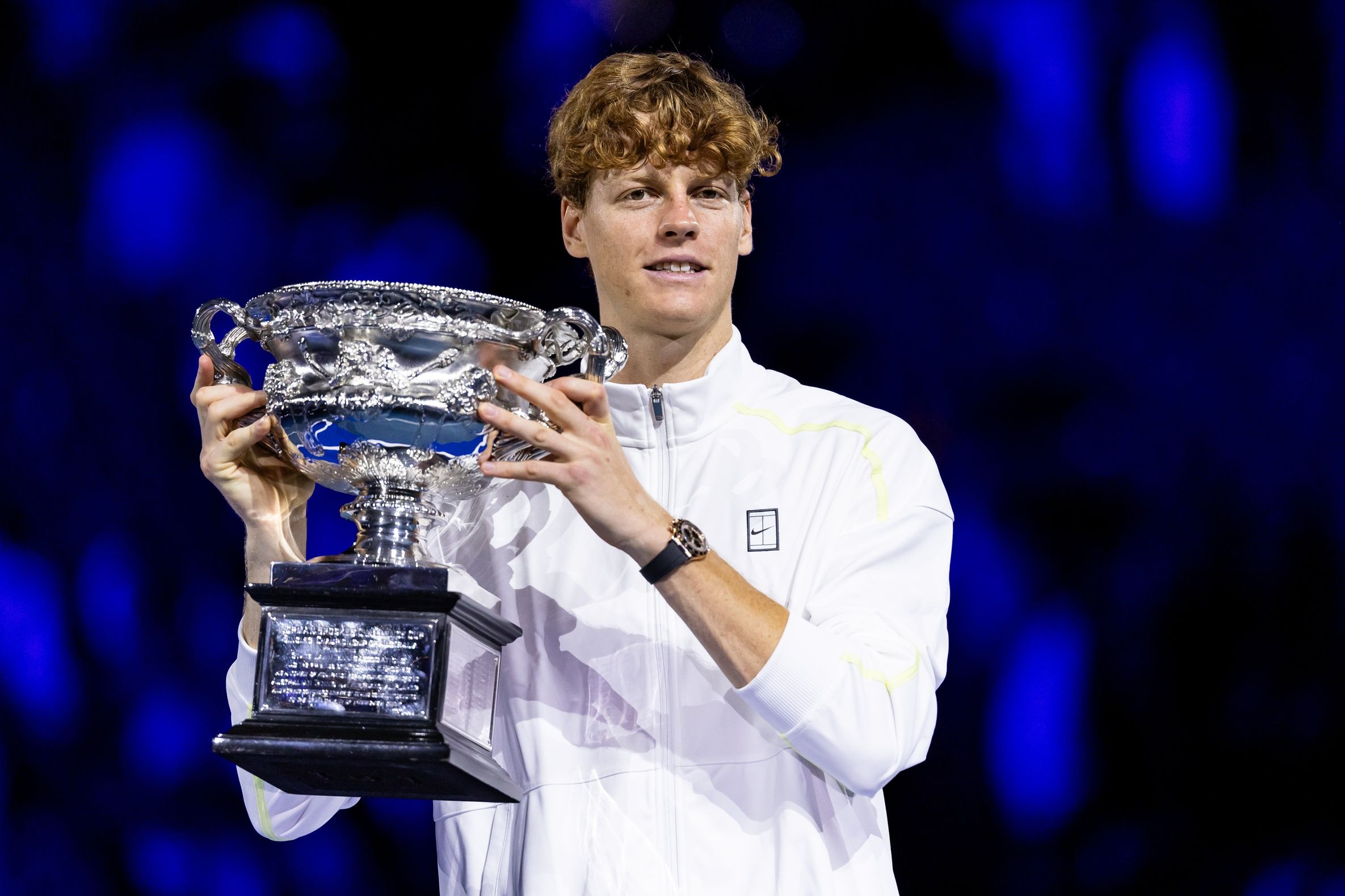 Jannik Sinner of Italy celebrates with the Australian Open title during the prize presentation of the men's single at the 2025 Australian Open at Melbourne Park.