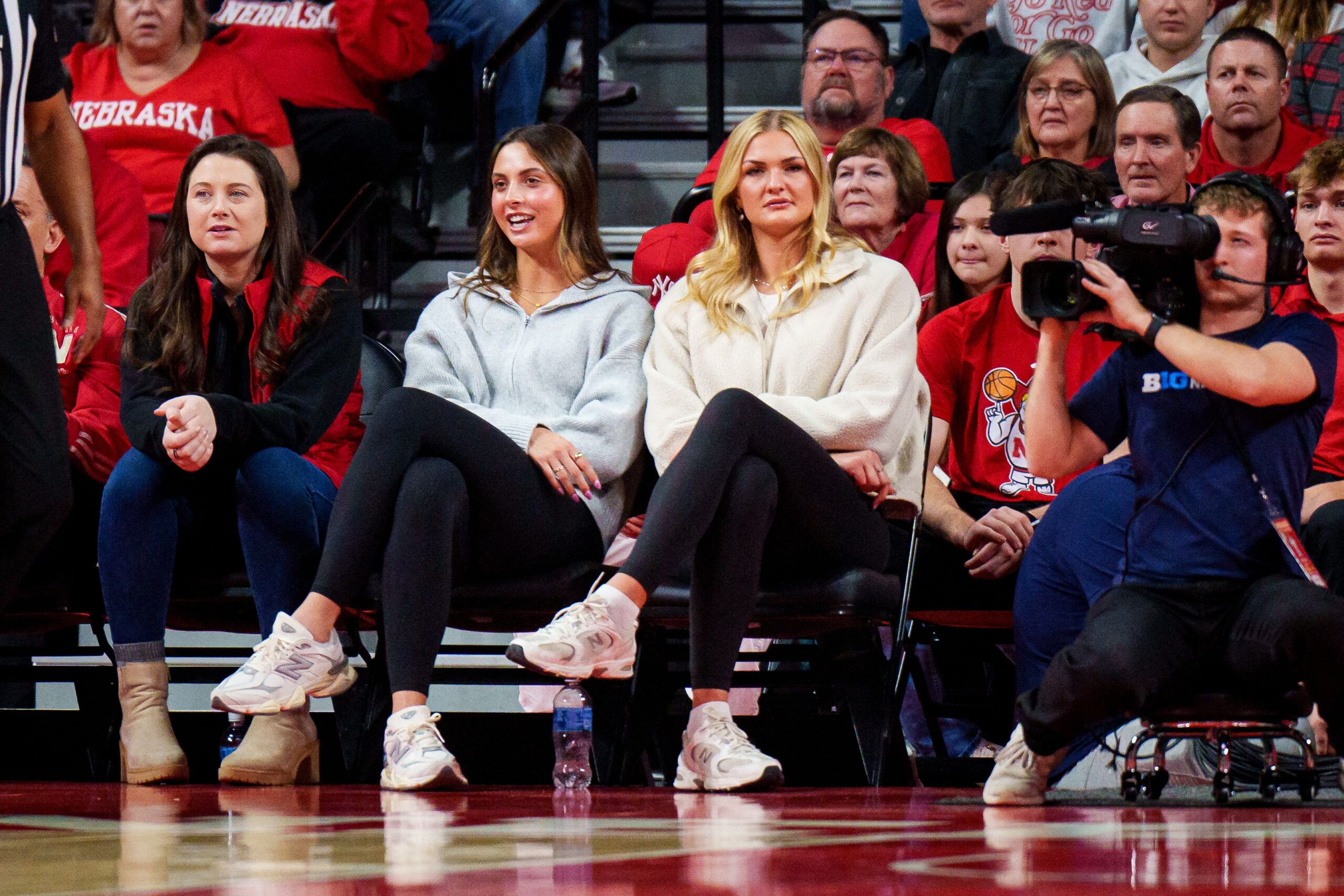 Omaha Supernovas and former Nebraska Cornhuskers volleyball players Merrit Beason and Leyla Blackwell watch during the first half against the Oregon Ducks at Pinnacle Bank Arena.