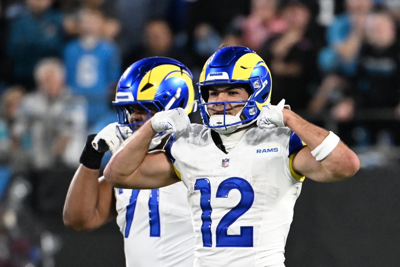 Los Angeles Rams wide receiver Puka Nacua (12) react in the fourth quarter in an NFC Wild Card Round game at Bank of America Stadium.