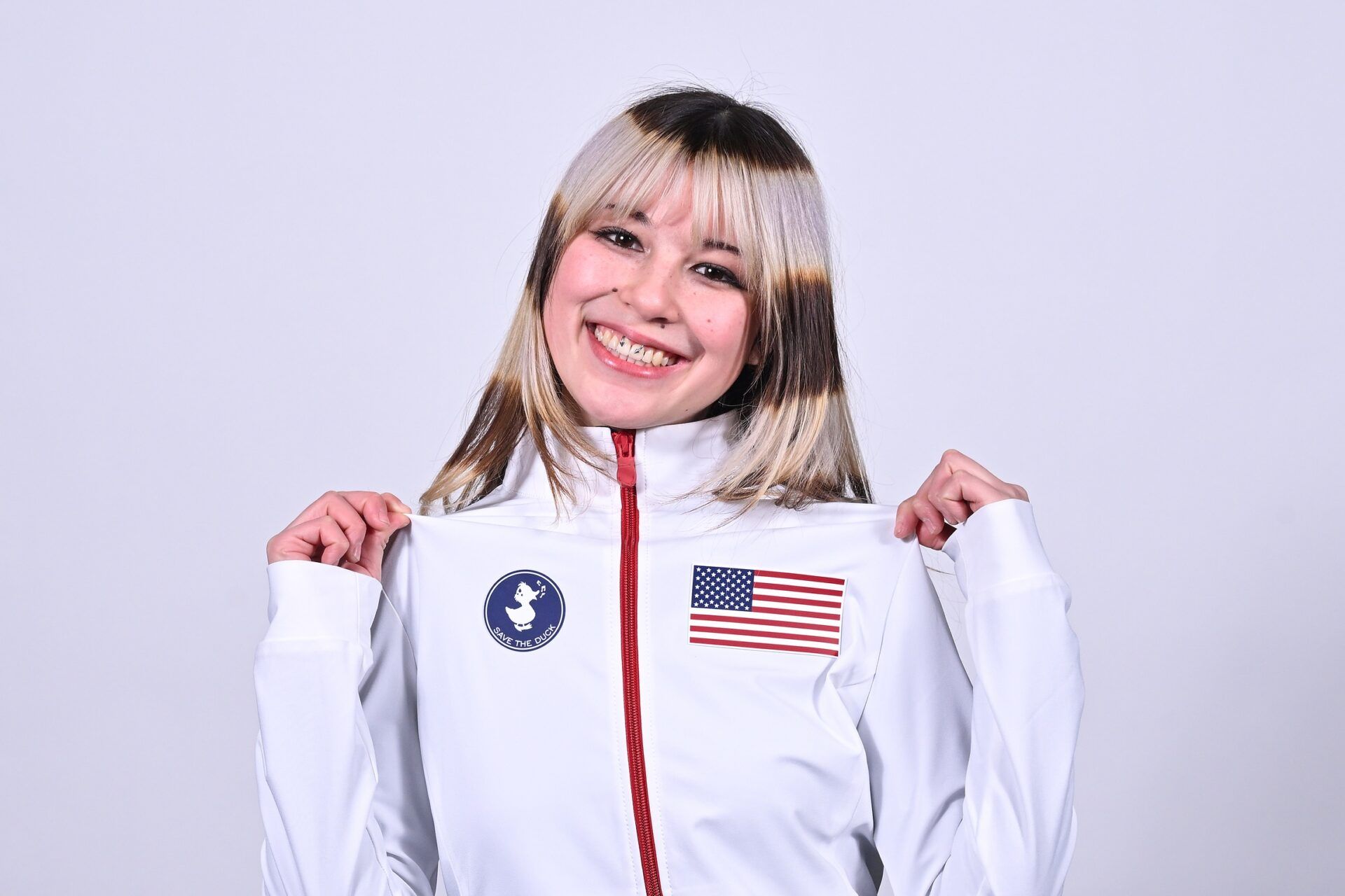 Alysa Liu poses for a photo following the 2026 Milan Olympics figure skating team announcement show at Enterprise Center.