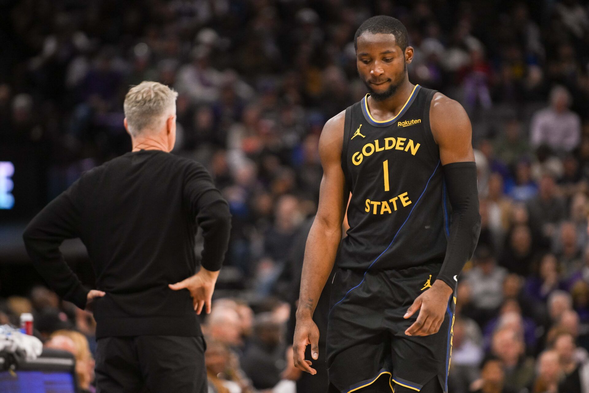 Golden State Warriors forward Jonathan Kuminga (1) walks off the court after being removed from the game during the fourth quarter of the game against the Sacramento Kings at Golden 1 Center.